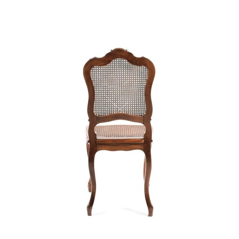 Four French Louis XV Style Cane Walnut Dining Chairs.  In Excellent Condition In Vancouver, British Columbia