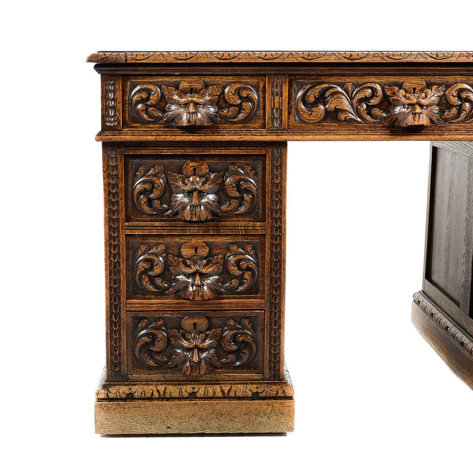 Hand-Carved Antique English Late Victorian Intricately Carved Oak Desk, 19th Century