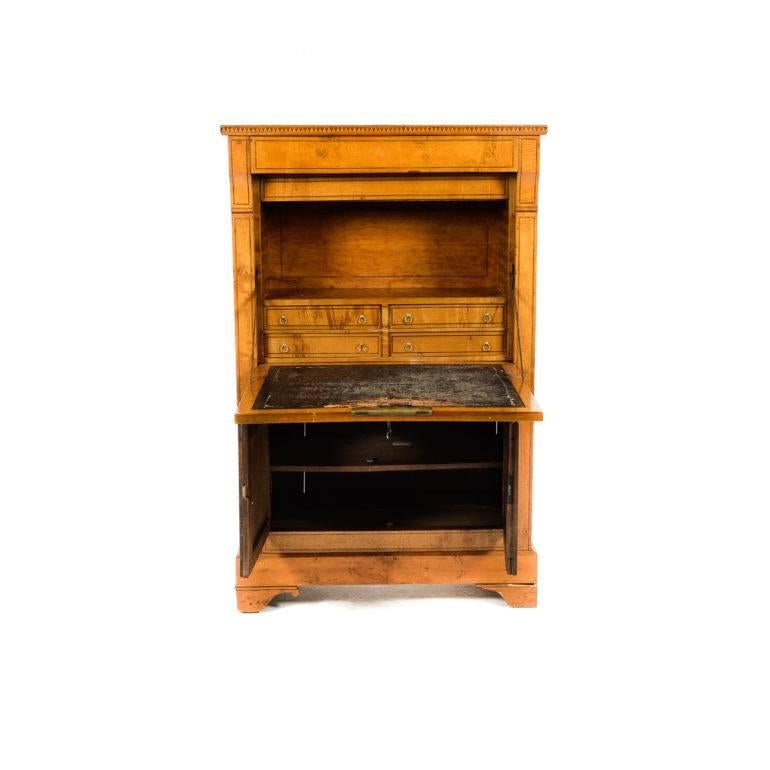 Antique French fruitwood secretary with inlaid interior, circa 1850. This is an exceptional piece with beautifully inset contrasting inlays, ample storage, and the original hand-tooled leather top. Would be perfect for a small laptop and printer