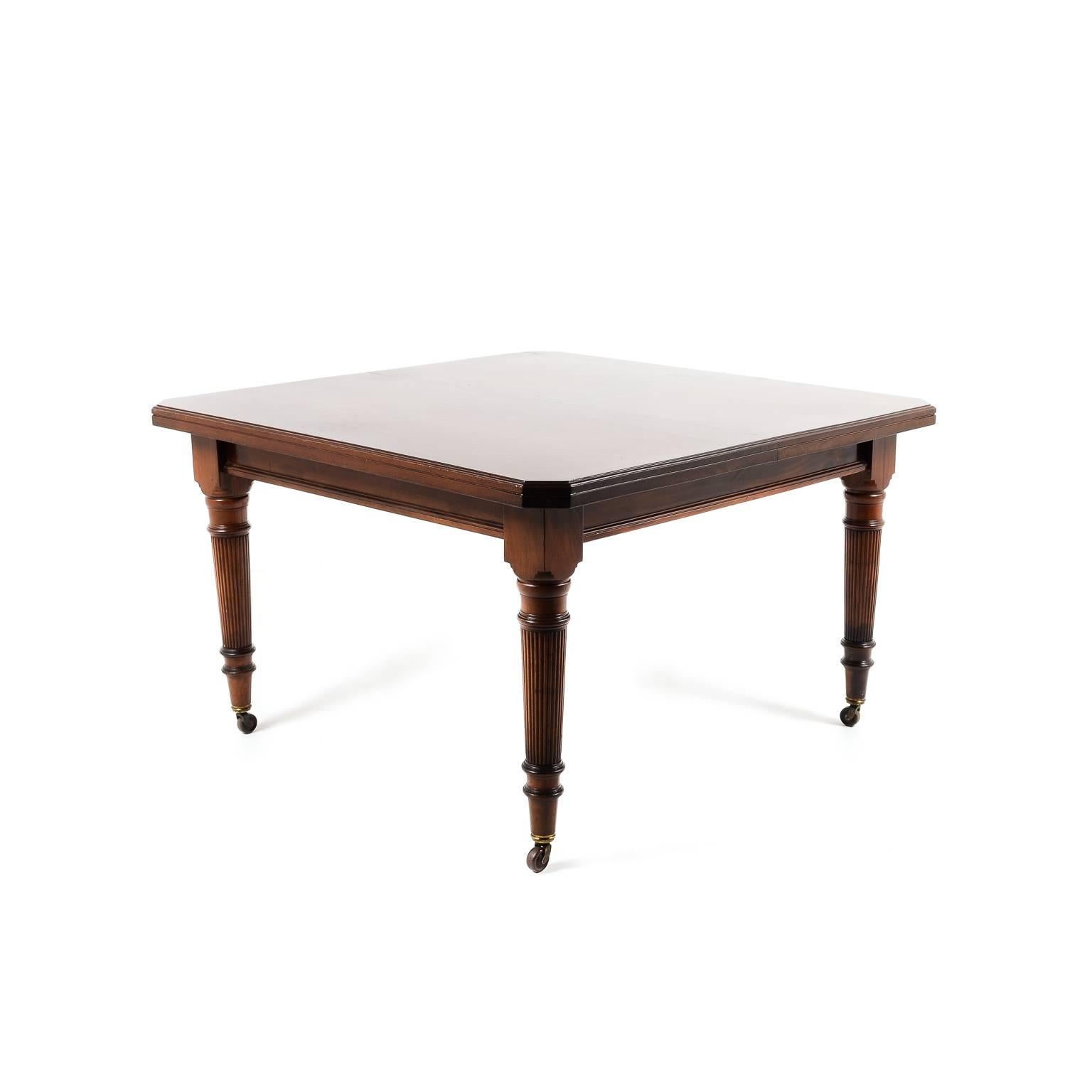 Antique, top quality, solid mahogany English table. Signed ‘Maple & Co’, circa 1900. One leaf, original casters.

Maple & Co was one the largest and most successful British furniture retailers and cabinet makers in the Victorian and Edwardian