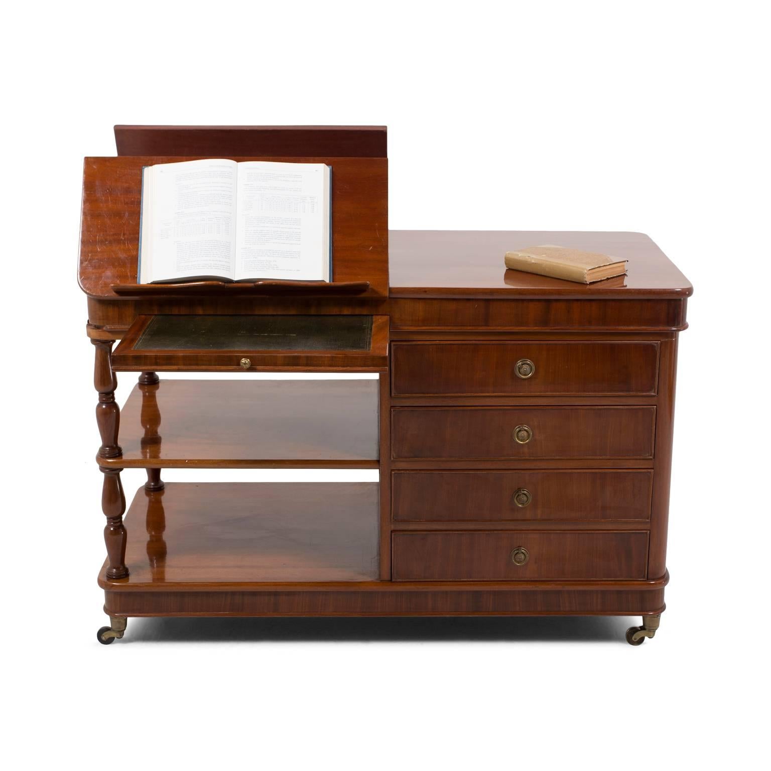 An unusual English mahogany reading stand with adjustable book stands, drawers, a cupboard and shelves. Lovely brass fittings, circa 1860. Perfect for the home office.