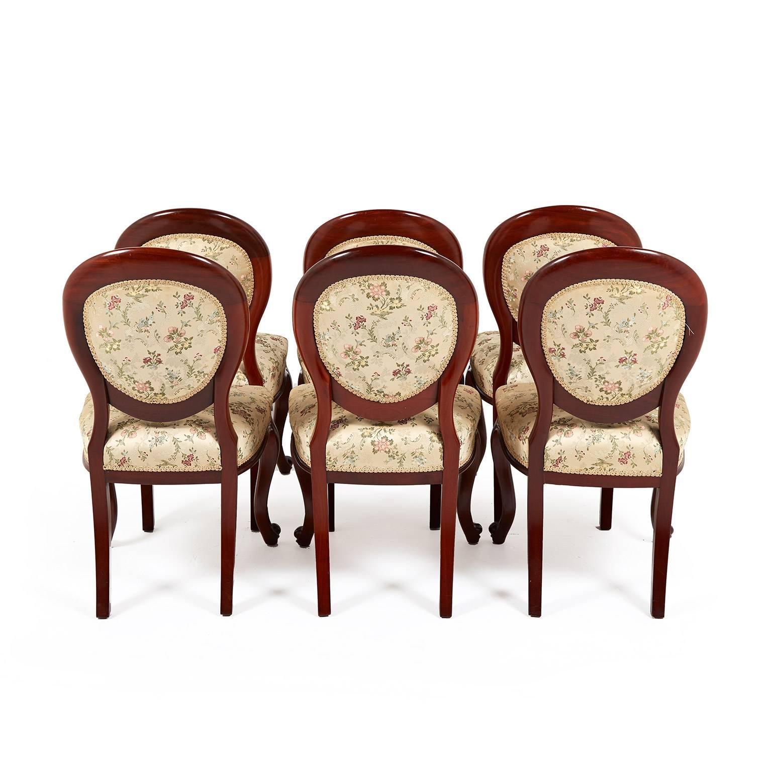 Antique set of six solid mahogany carved Victorian dining chairs, with upholstered cameo backs, circa 1870. Beautiful and functional, these chairs are solid and suitable for everyday use.



 
