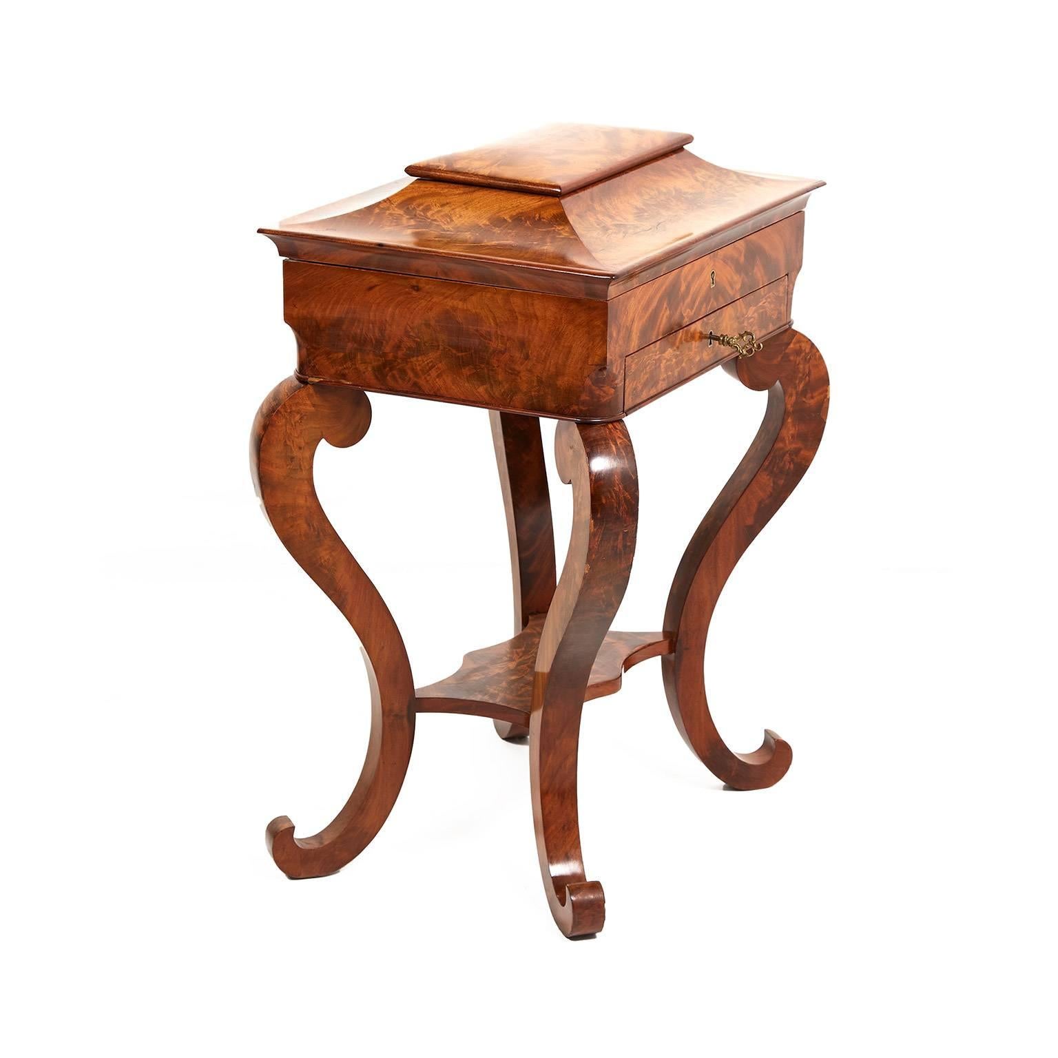 Antique French, Empire-style , lady’s work table or vanity. With satin birch interior, and a mirror, a single drawer and a lidded top compartment. An unusual and attractive style to this piece, circa 1850. Its small size makes it ideal for any