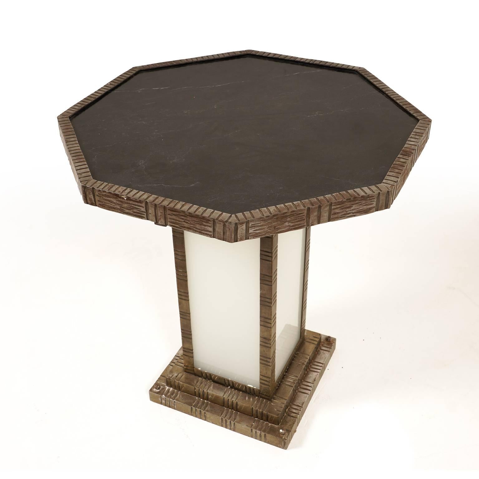 A French Art Deco octagonal side table, the marble top and base are framed in metal and the piece has an illuminating etched-glass base. Attributed to Edgar Brandt, Paris. Rewired for North American use, circa 1930.



