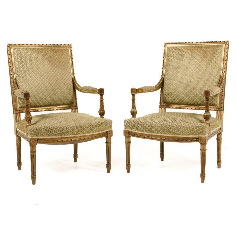 Elegant, early 20th Century, French Louis XVI-style, hand-carved gilt salon set, consisting of two armchairs and a settee. Structurally, this set is in excellent original condition.

Settee: 50″ Wide x 27″ Deep x 37″ Tall x 18″