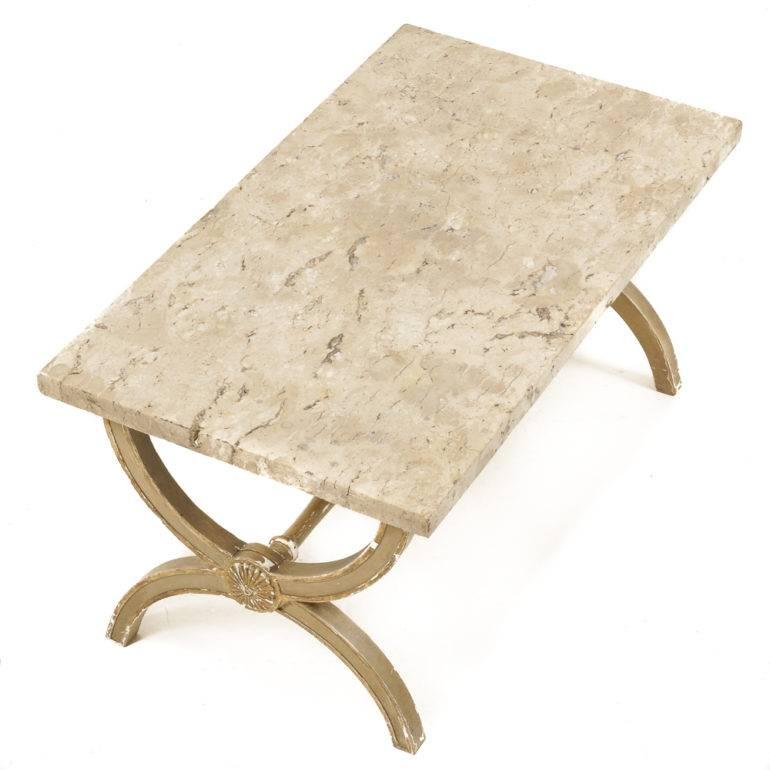 Italian, hand-painted, wood-and-gesso coffee table. Distressed wooden base, and a gorgeous cut of marble. Circa 1950.


