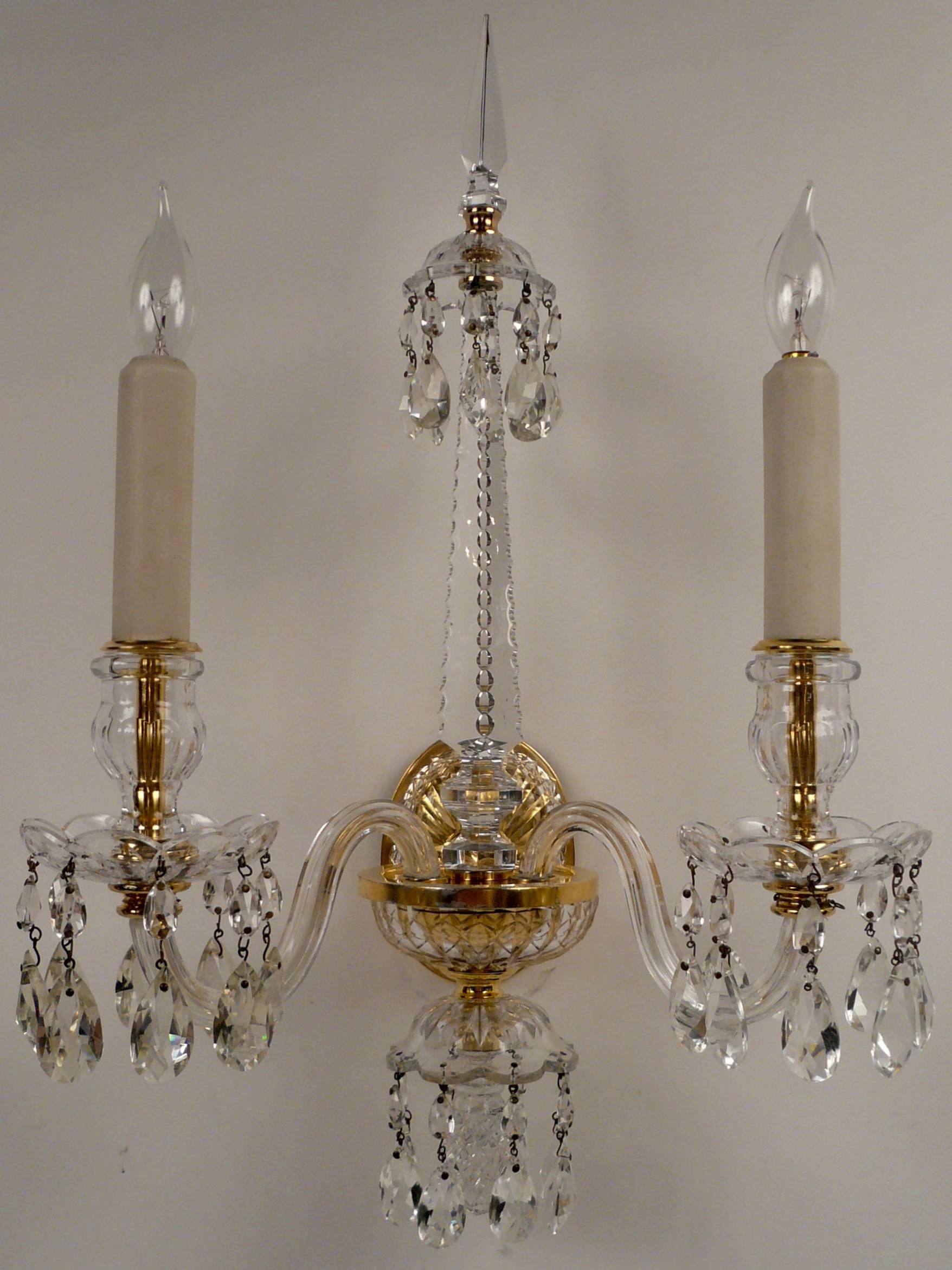 These four sconces are of the finest quality, with original gilding and cut crystal.
    