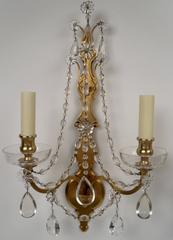 Pareja de apliques de dos luces de bronce dorado y cristal de Sterling Bronze Co. N.Y