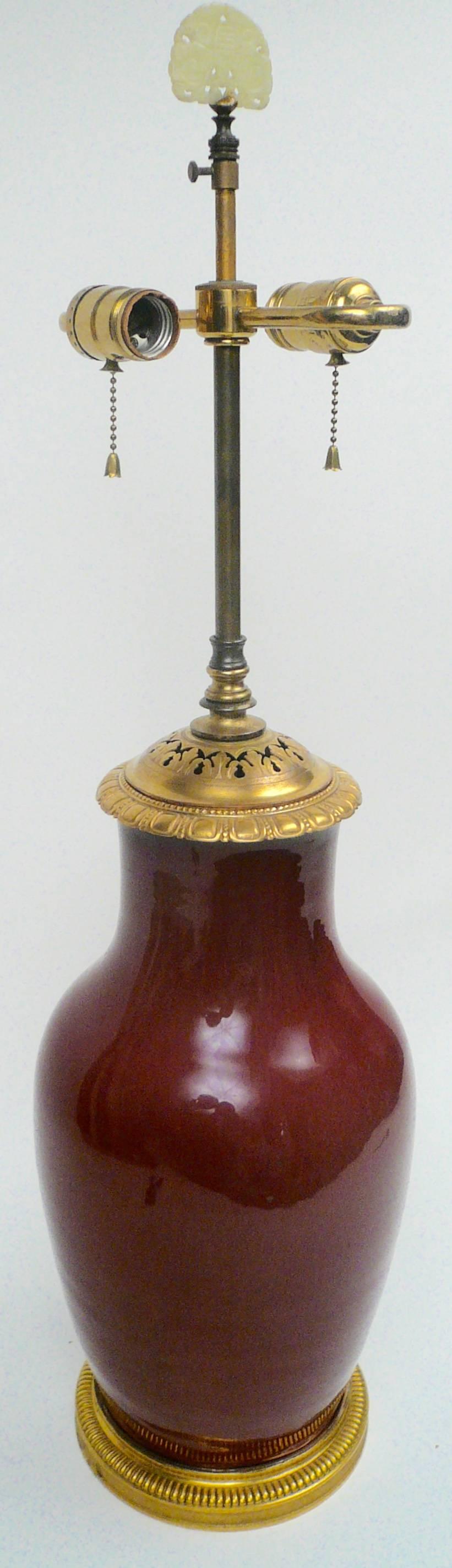 Chinese Export Chinese Sang de Boeuf Porcelain and Gilt Bronze-Mounted Lamp