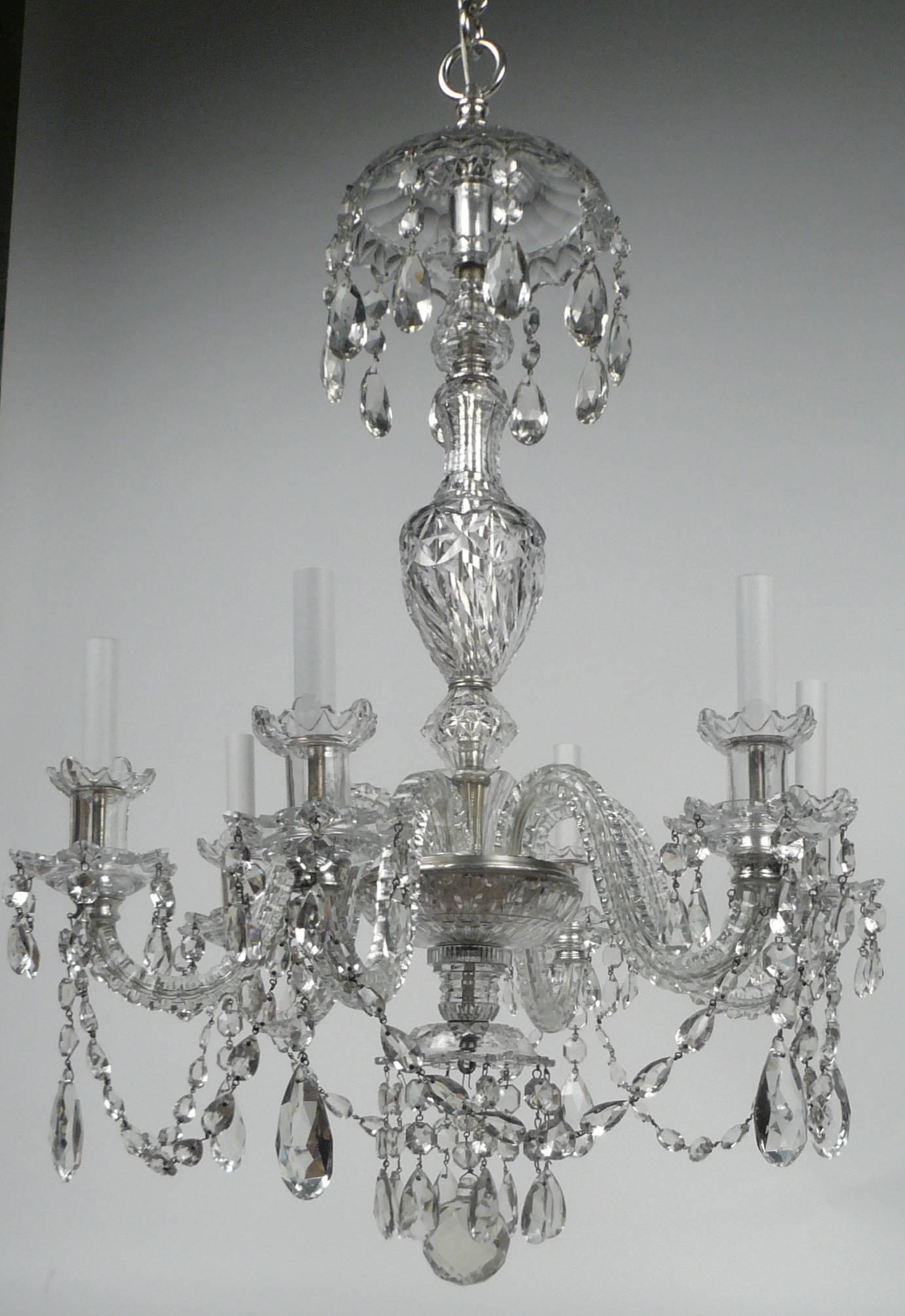 This six arm cut crystal Caldwell chandelier is beautifully proportioned, and of the finest quality. The fittings are cast bronze, and silver plated.