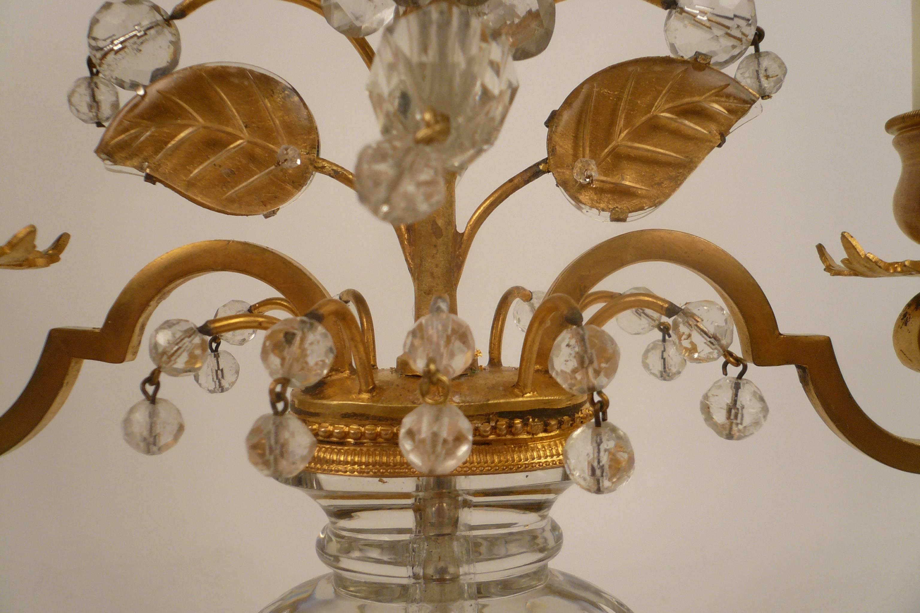 Faceted Pair of French Gilt Bronze and Rock Crystal Candelabra by Maison Baguès