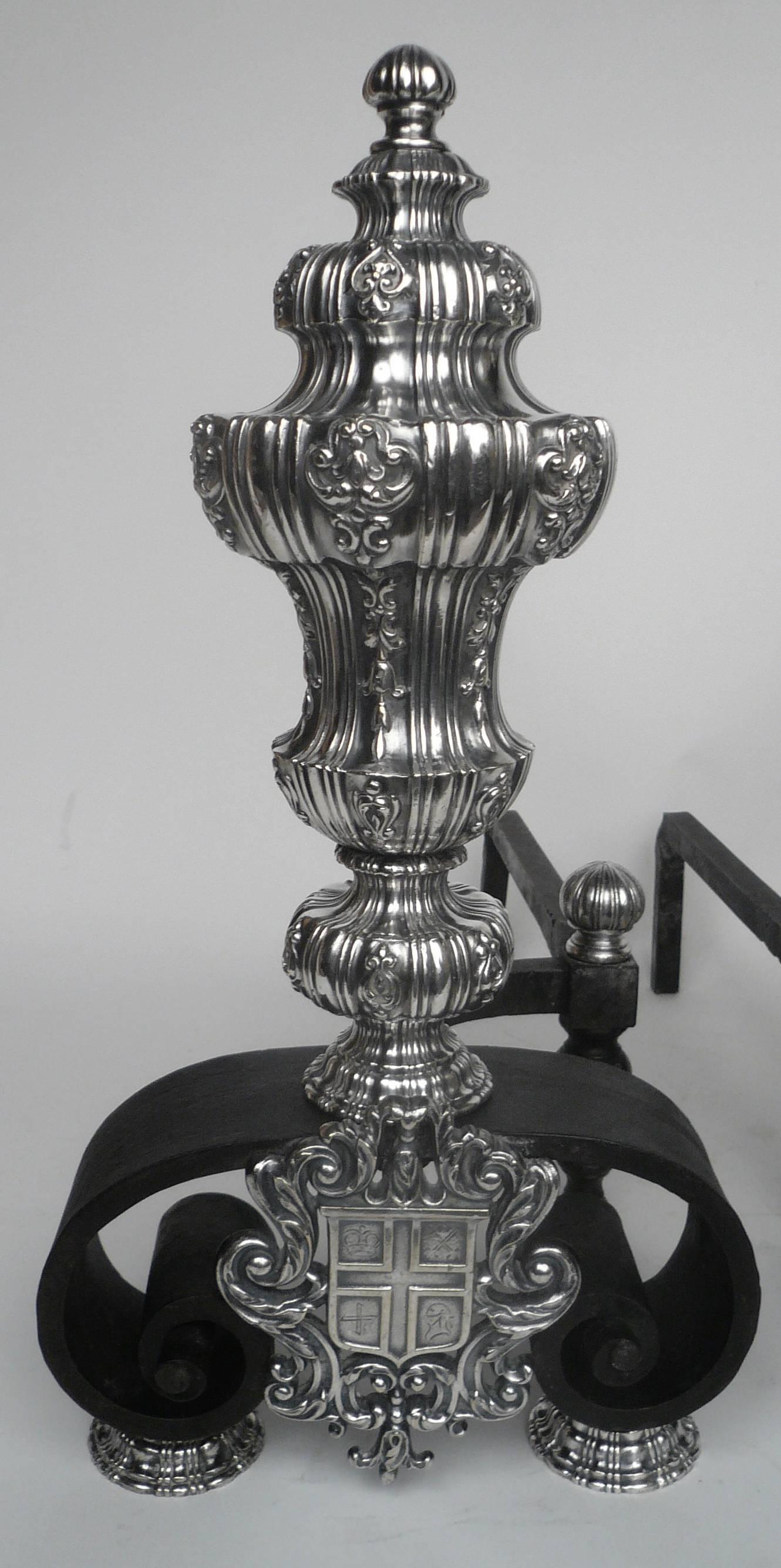 This fine quality pair of andirons are beautifully cast in silver plated bronze.