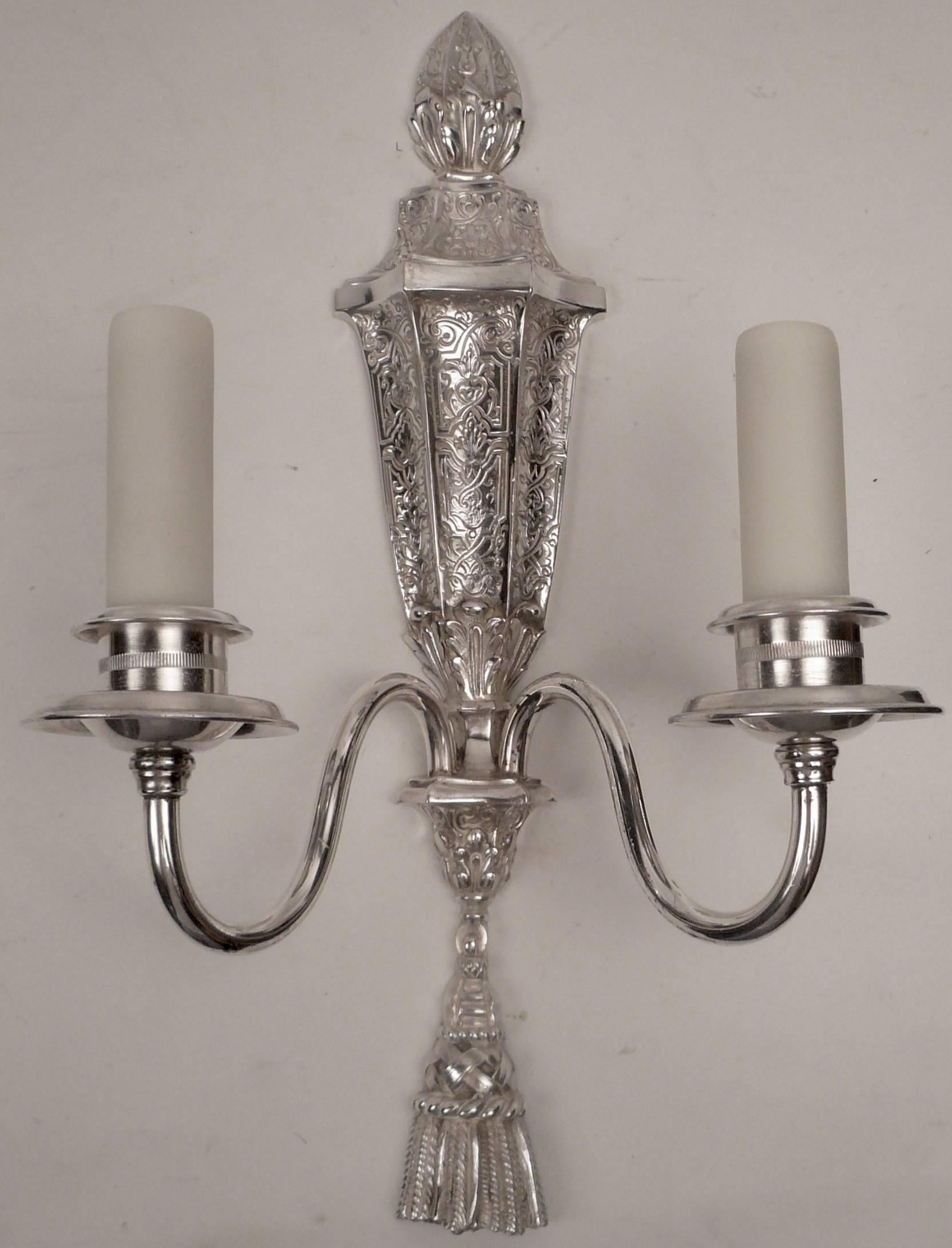 This beautiful set of six twin light sconces are in the early Georgian style.
They are hand chased, and finely detailed.