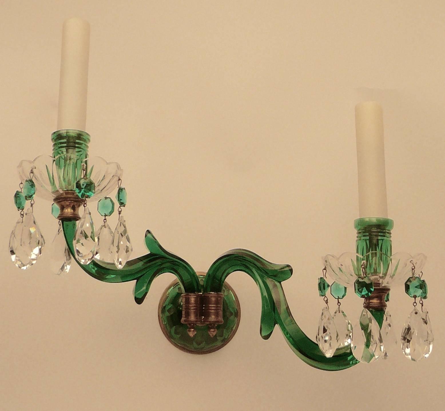 This rare pair of green cut-glass sconces are hand-cut and beautifully finished. They are candle powered, but could be easily be electrified at no additional cost.