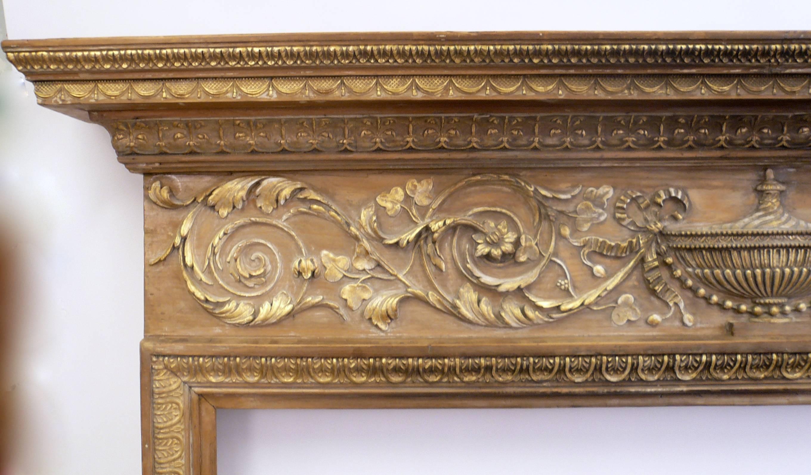 18th Century English Georgian Carved Pine Fireplace Mantle with Gilt Elements For Sale