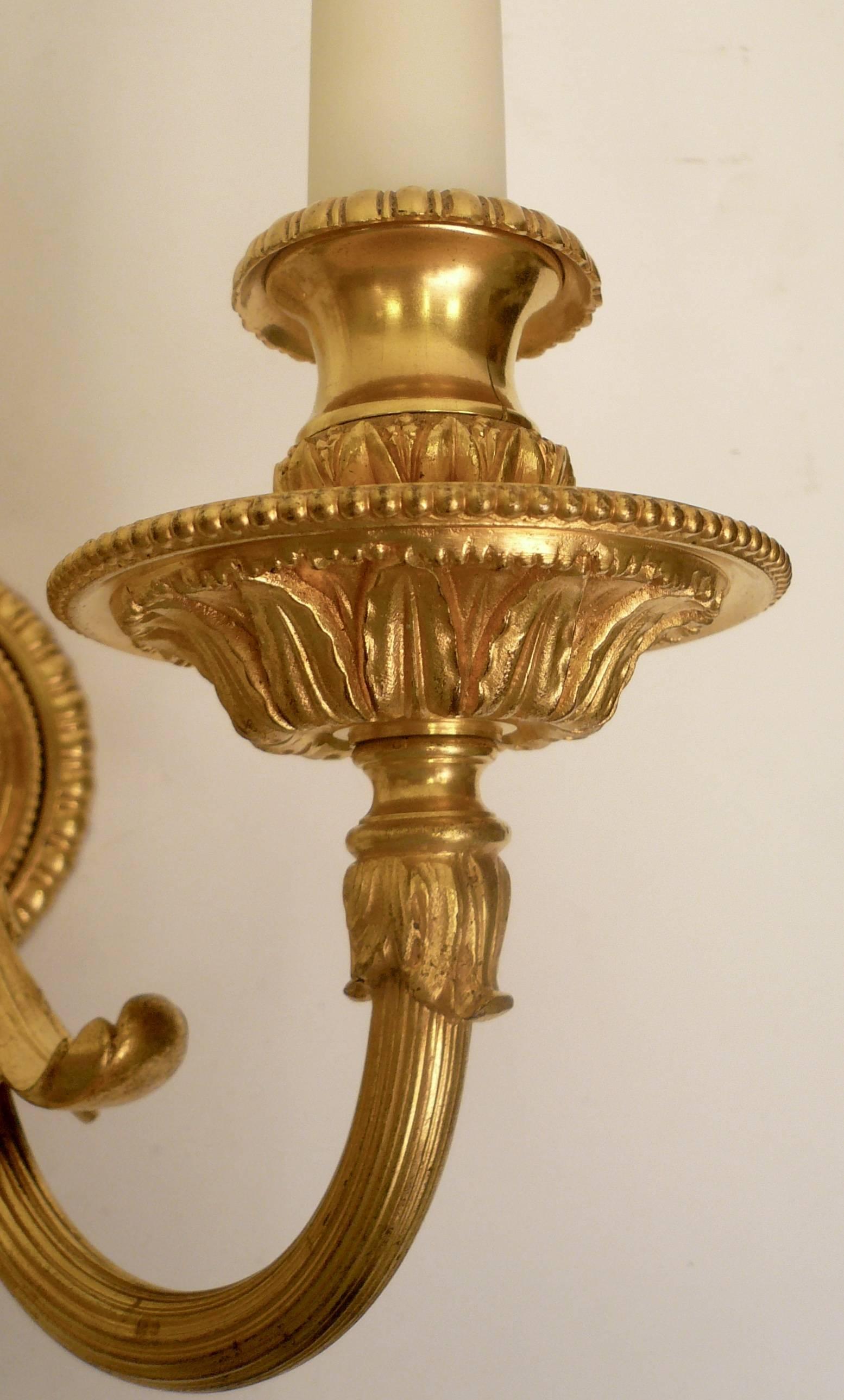 19th Century Pair of Neo-Cassical Gilt Bronze Three-Light Wall Sconces by E. F. Caldwell