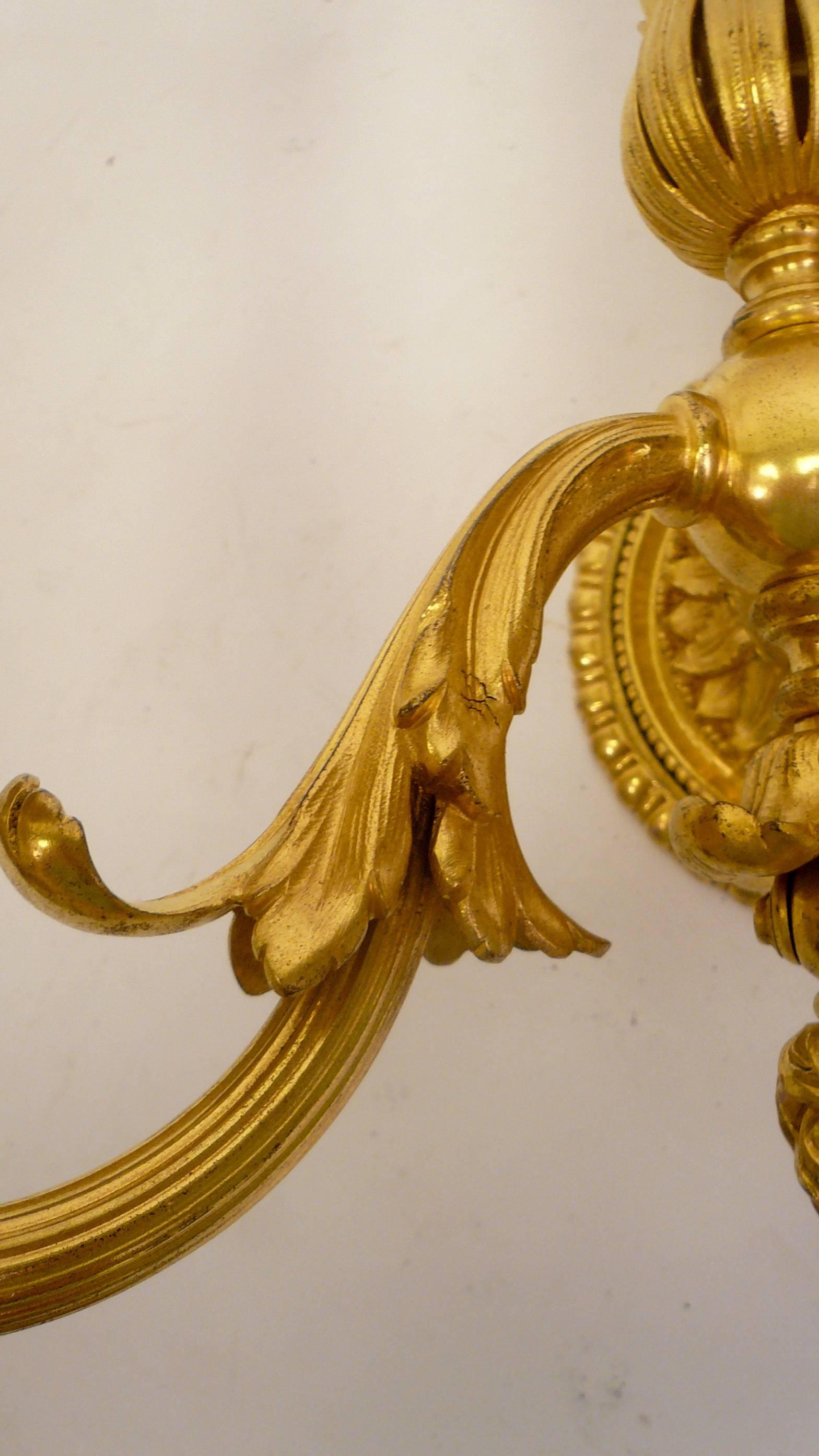 American Pair of Neo-Cassical Gilt Bronze Three-Light Wall Sconces by E. F. Caldwell