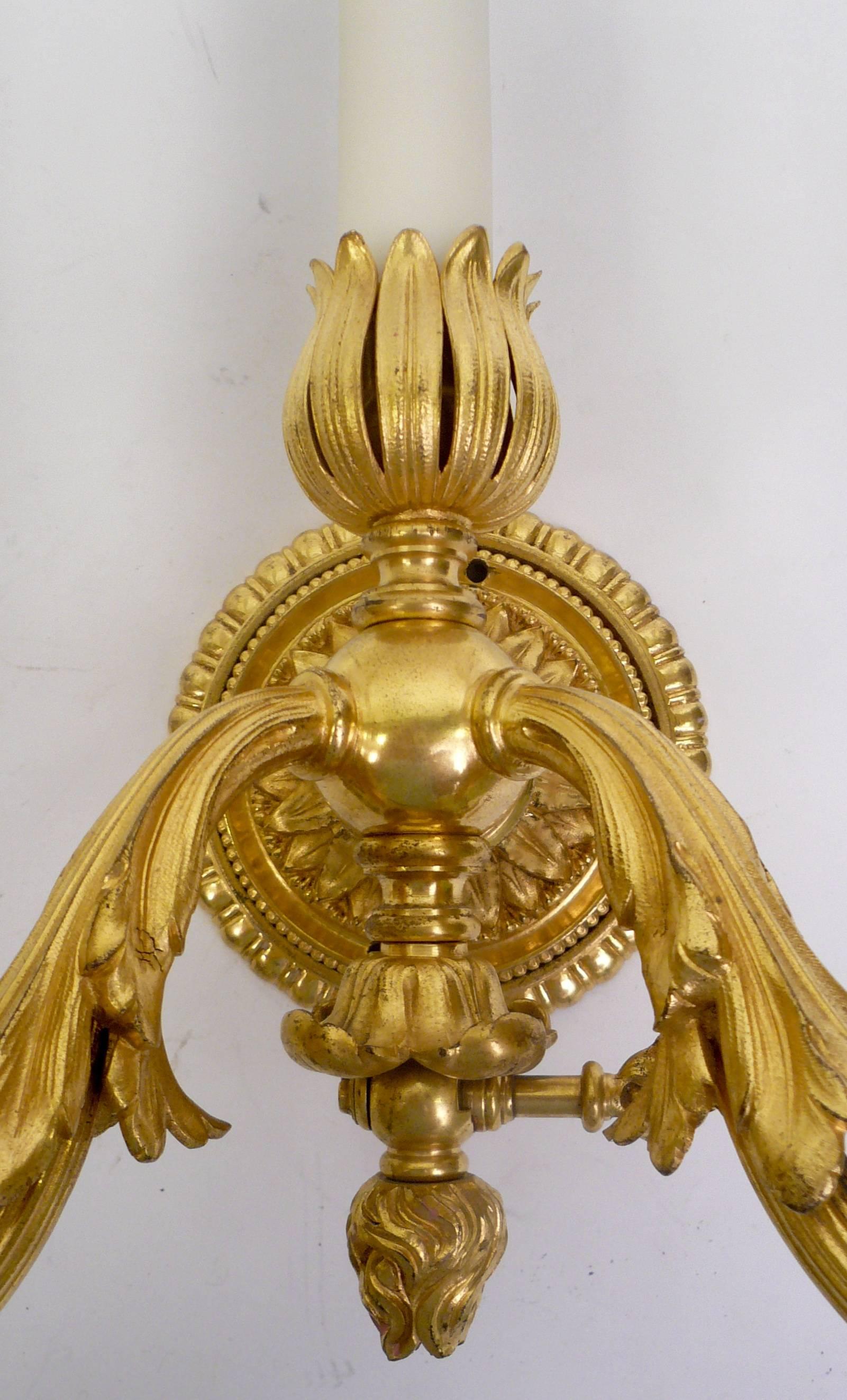Pair of Neo-Cassical Gilt Bronze Three-Light Wall Sconces by E. F. Caldwell In Excellent Condition In Pittsburgh, PA