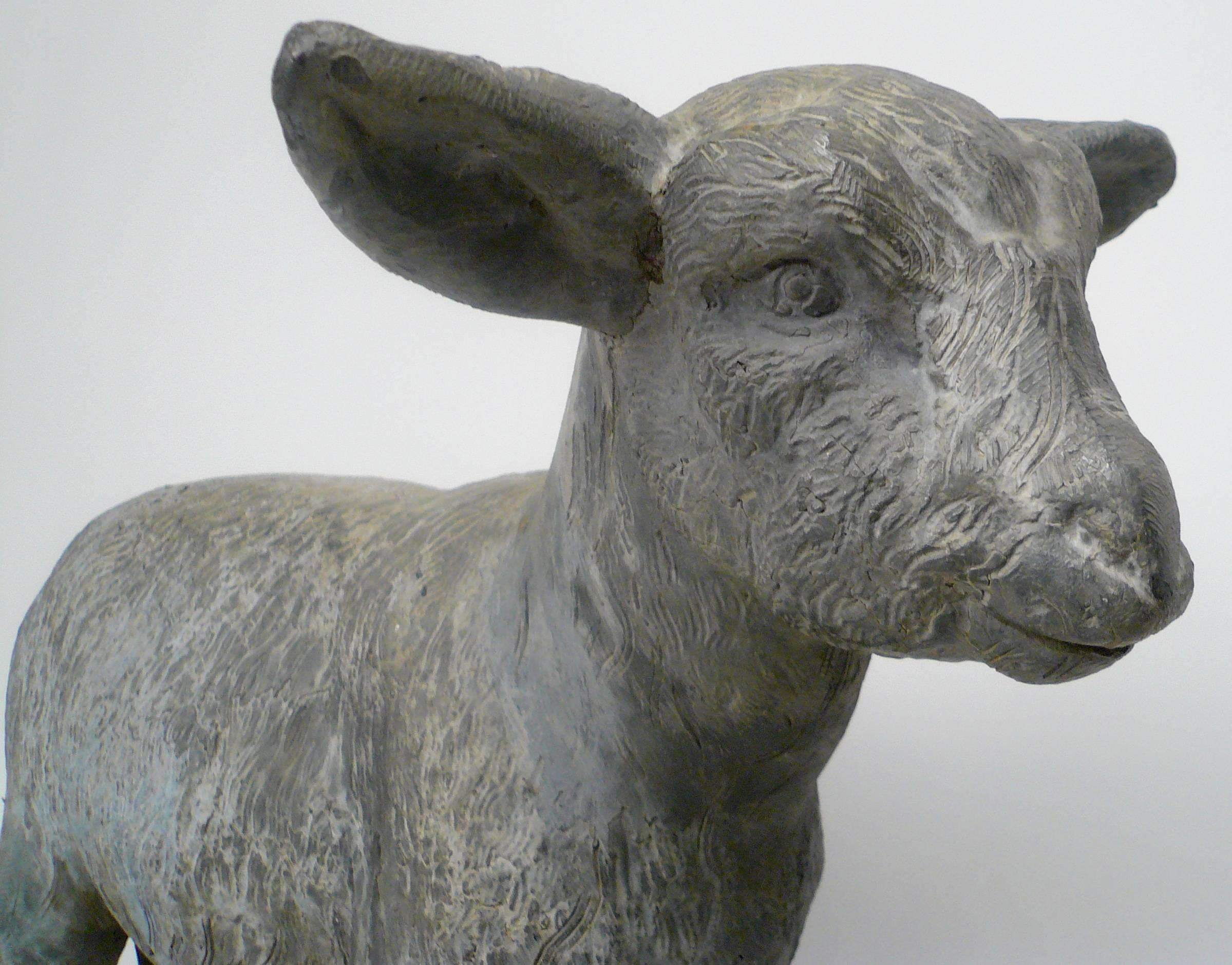 Charming English cast lead figure of a standing lamb.