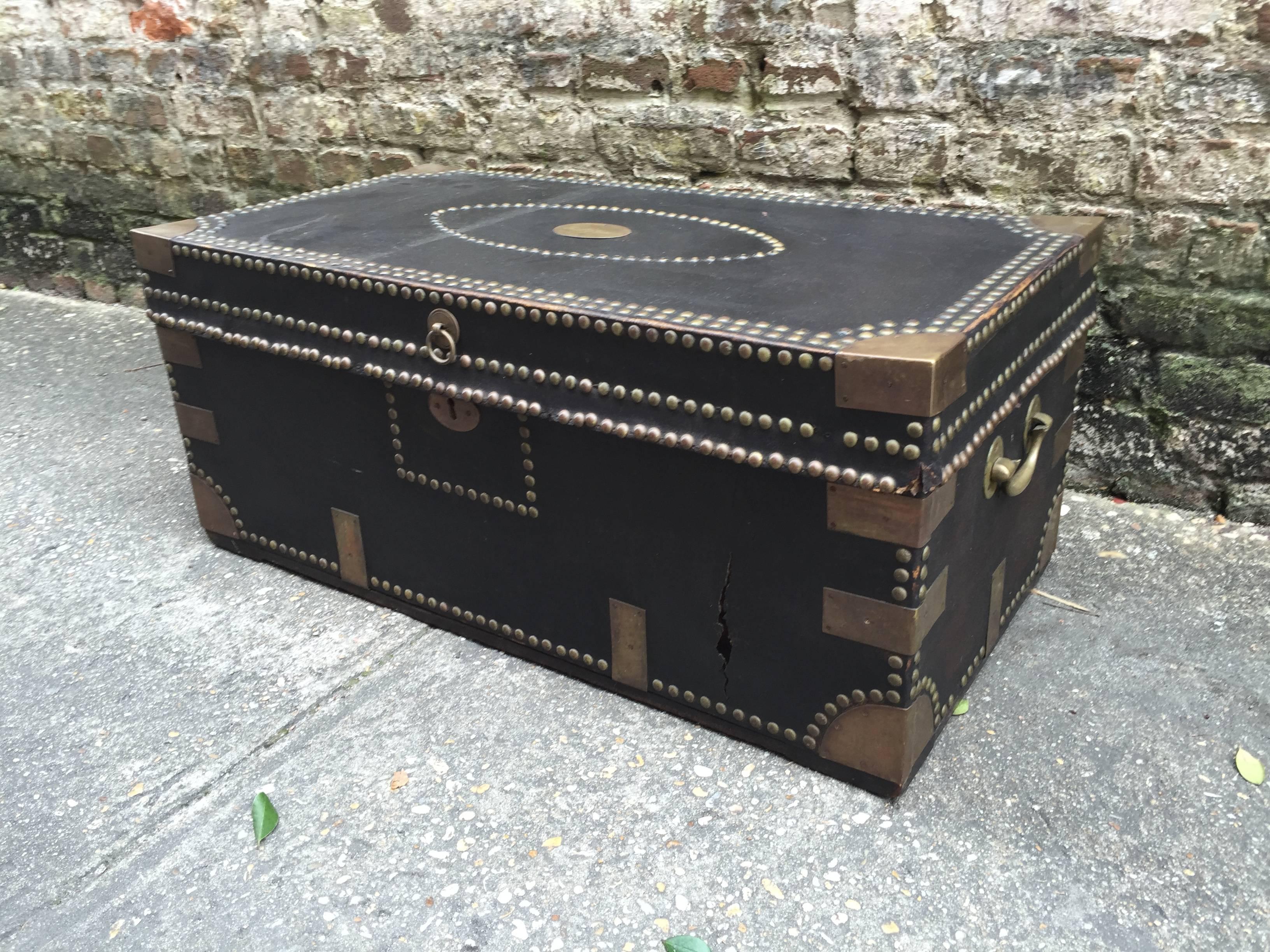 English leather bound with brass accents camphor shipping trunk.