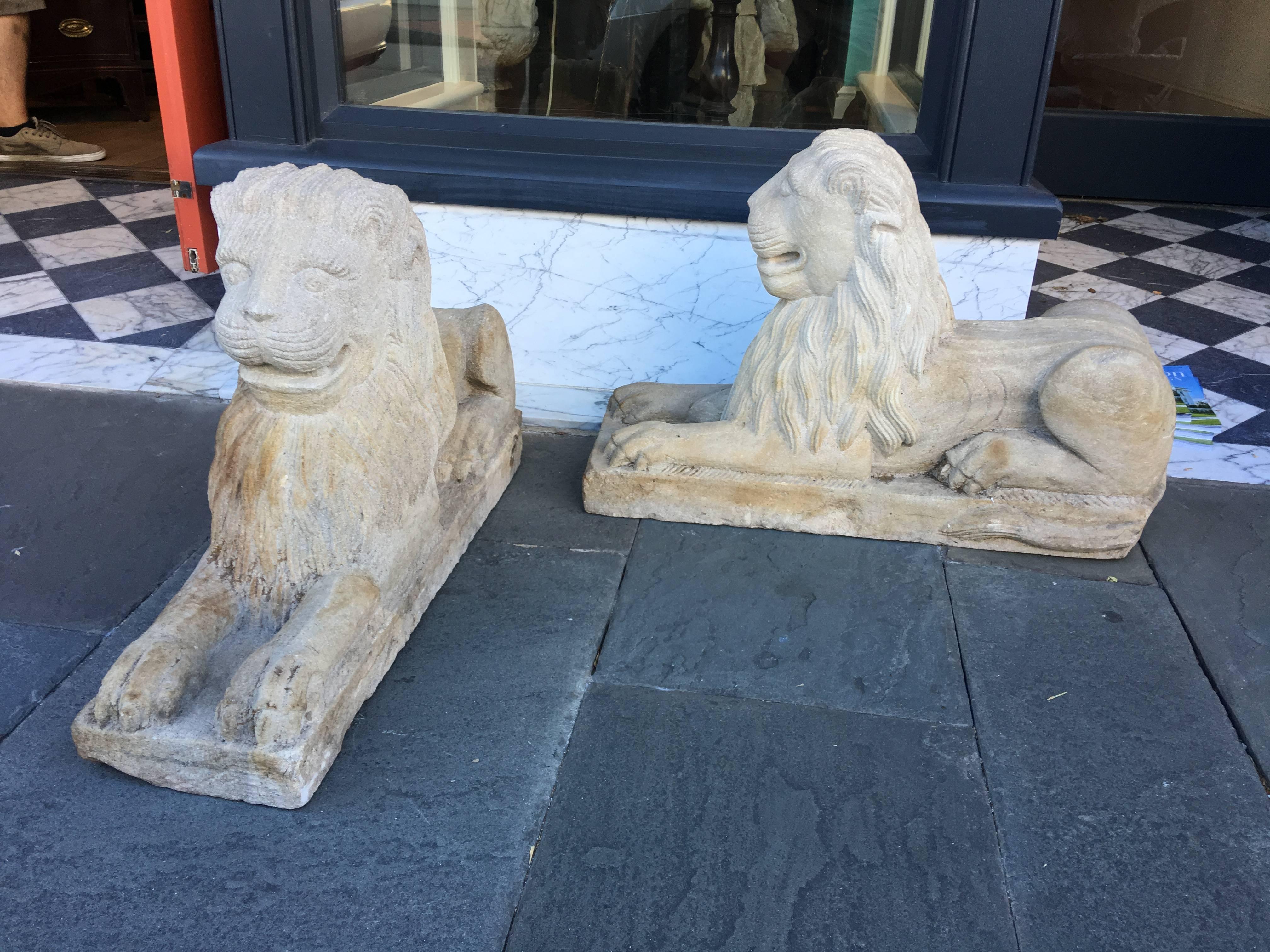 19th century cut stone lions.