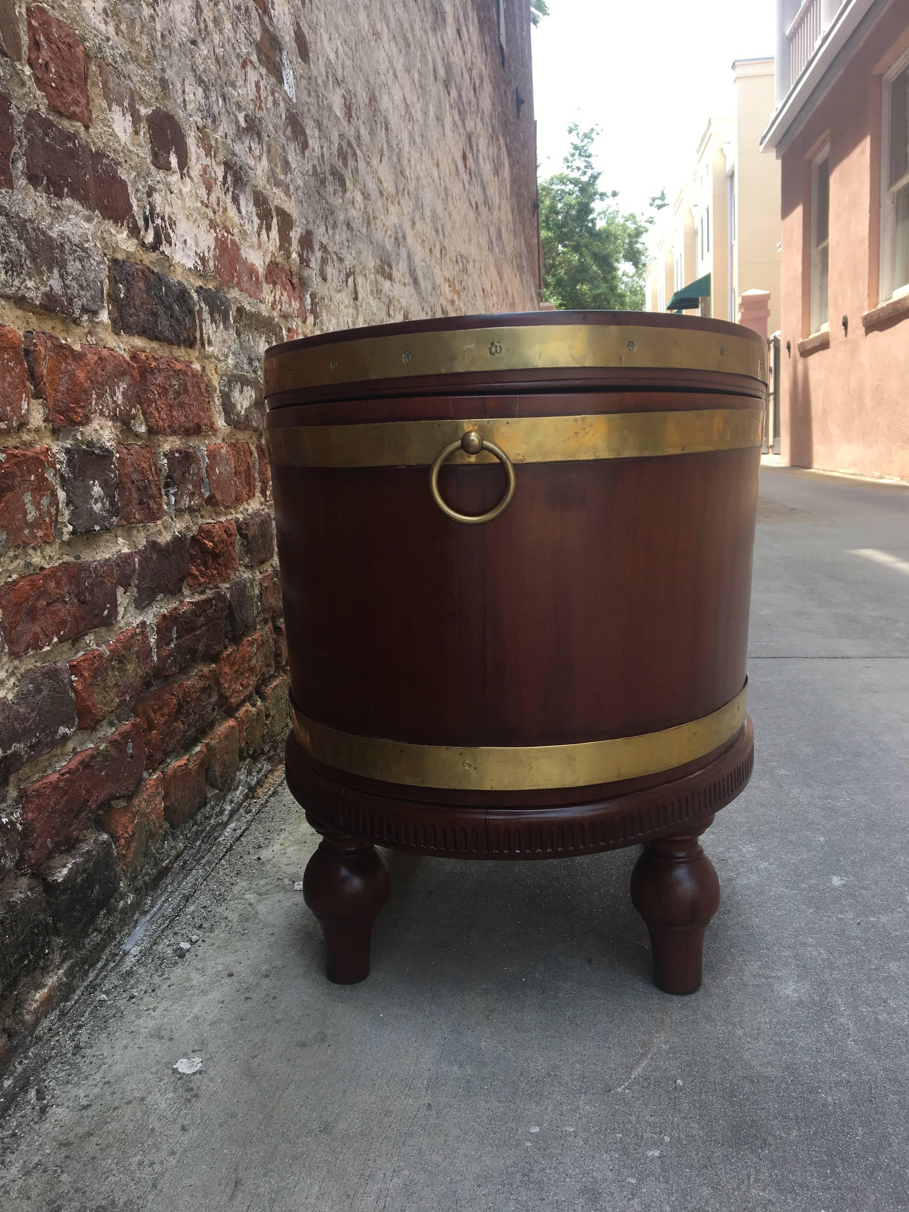 English 19th century mahogany wine cooler with brass banding.
