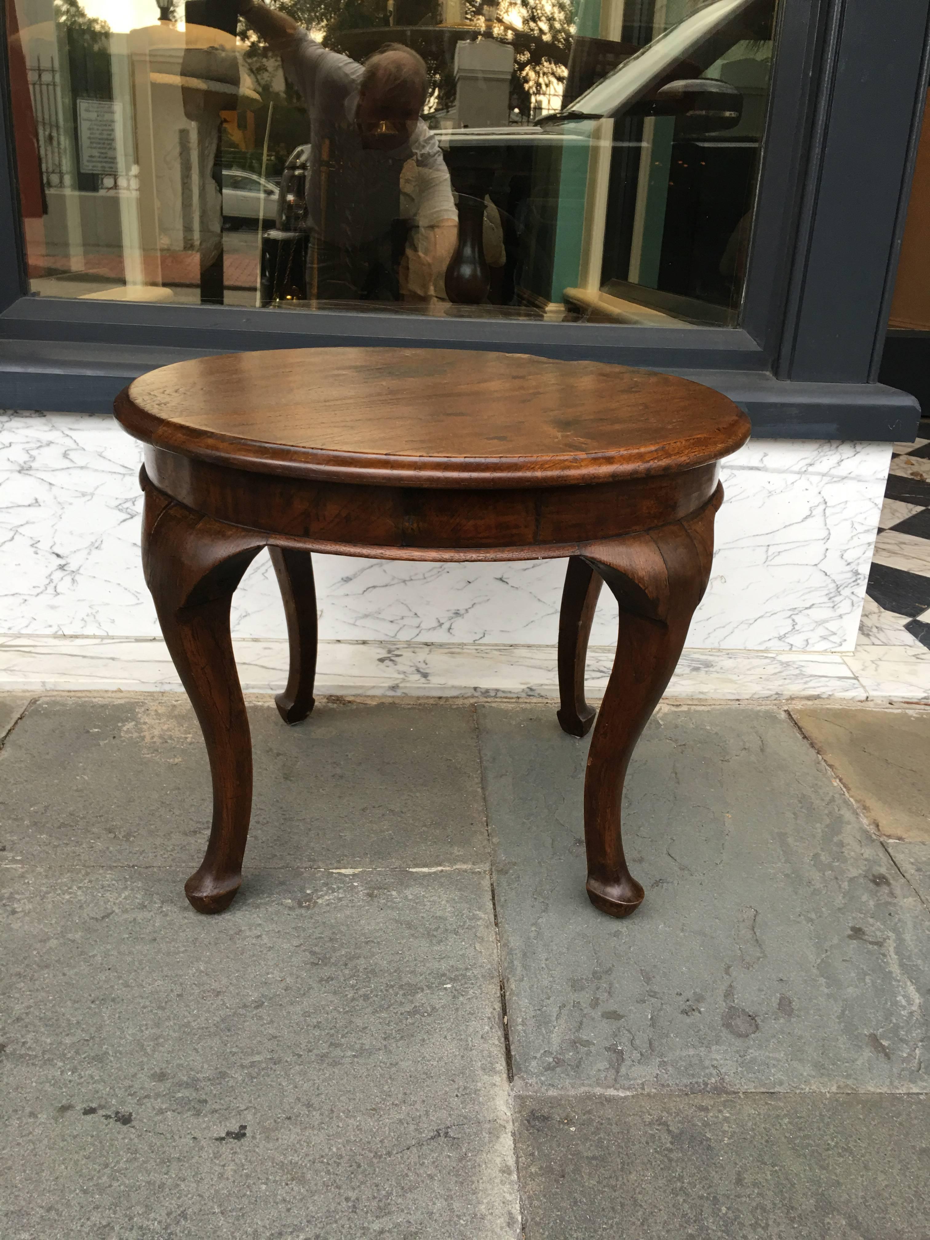 Nice small oak cocktail table with pad foot.