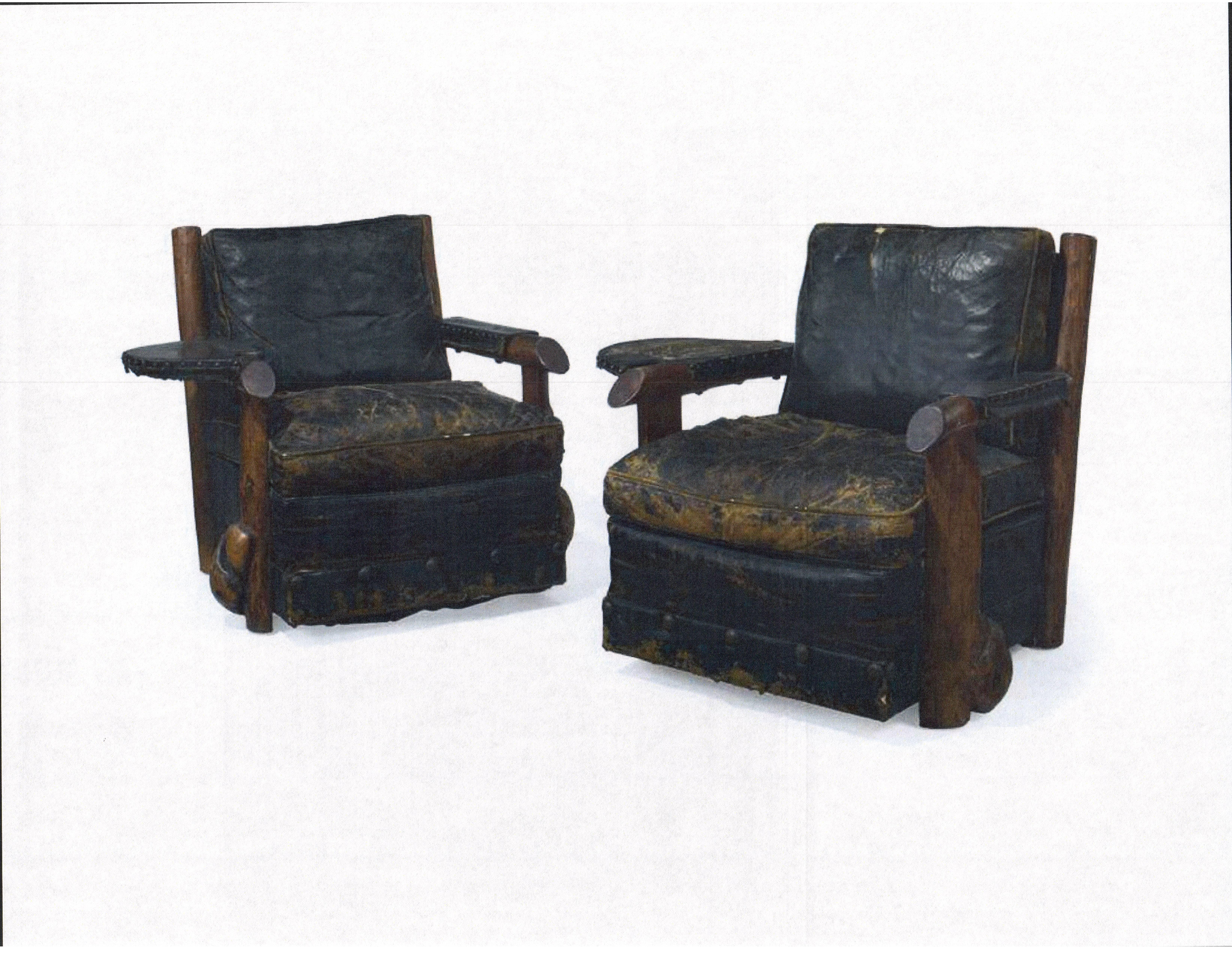 Pair of leather and fir club chairs and matching sofa of leather and fir. Made by Thomas C. Molesworth, circa 1945. The set retains its original dark green leather upholstery and estate condition finish.