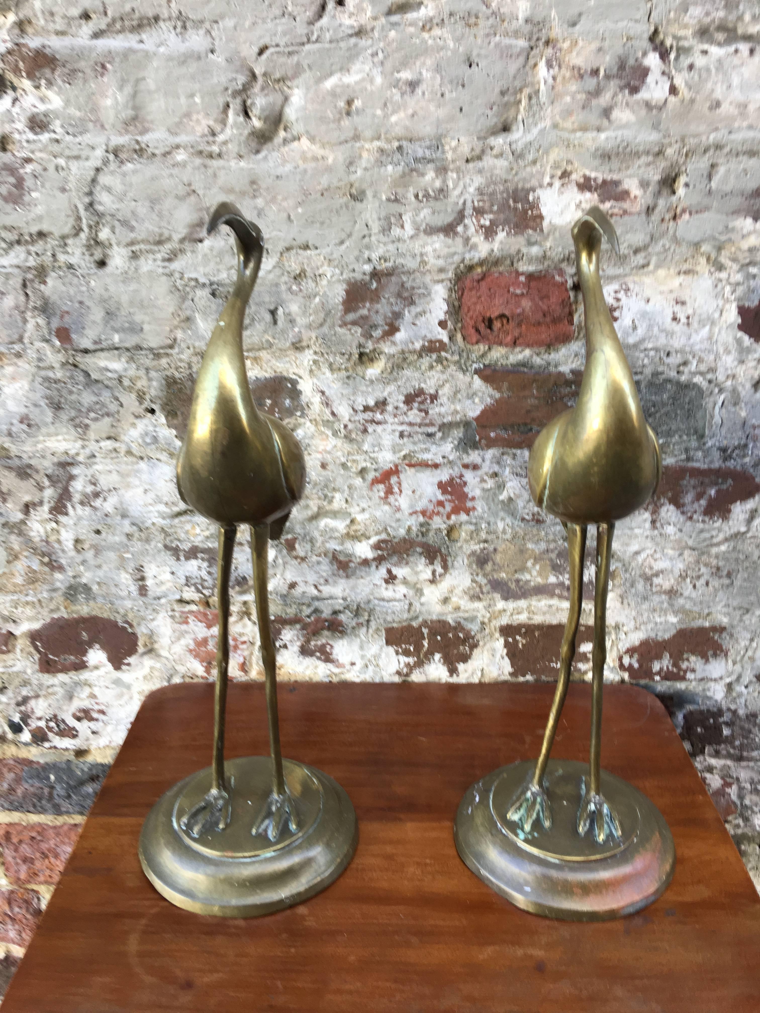 Pair of early 20th century brass egrets.
