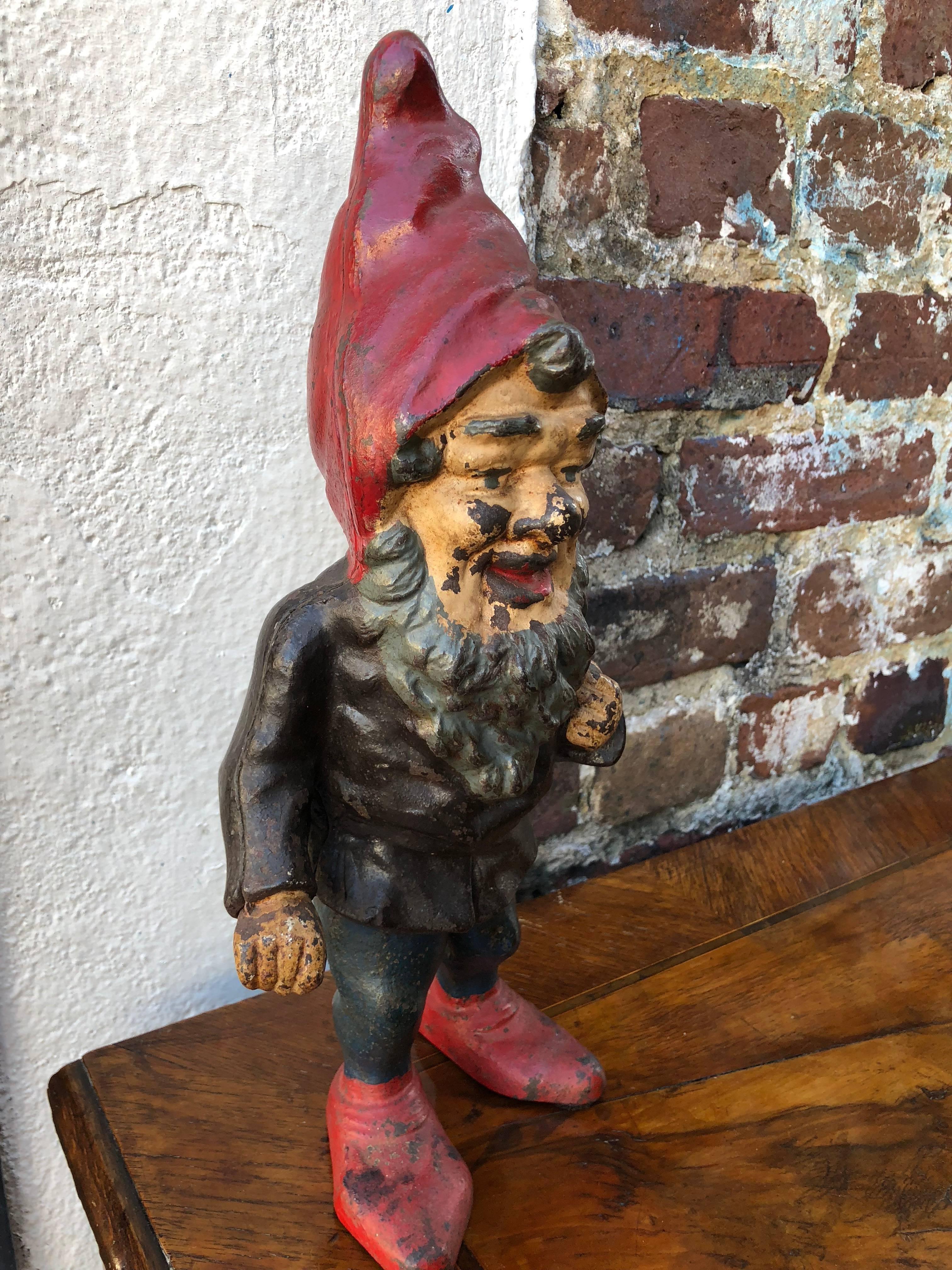 Cast iron gnome doorstop. Original paint early 20th century.