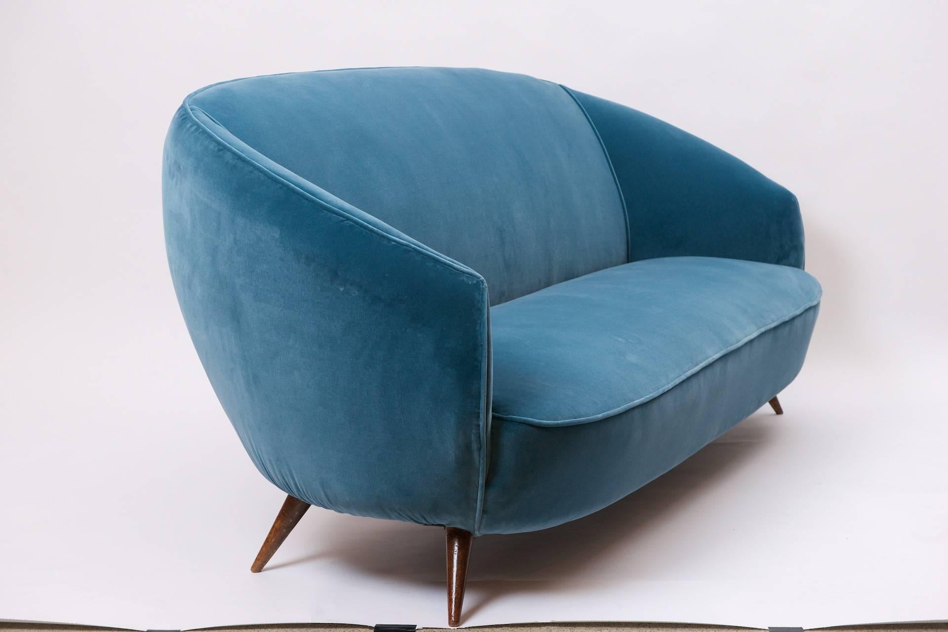 Curved Italian sofa. Has been re upholstered in blue velvet. 

Varese fabric, 100% cotton velvet. Designer's Guild. 
Fabric ref. Designer's Guild. F1190/14 Varese. Colour. Delft.
 