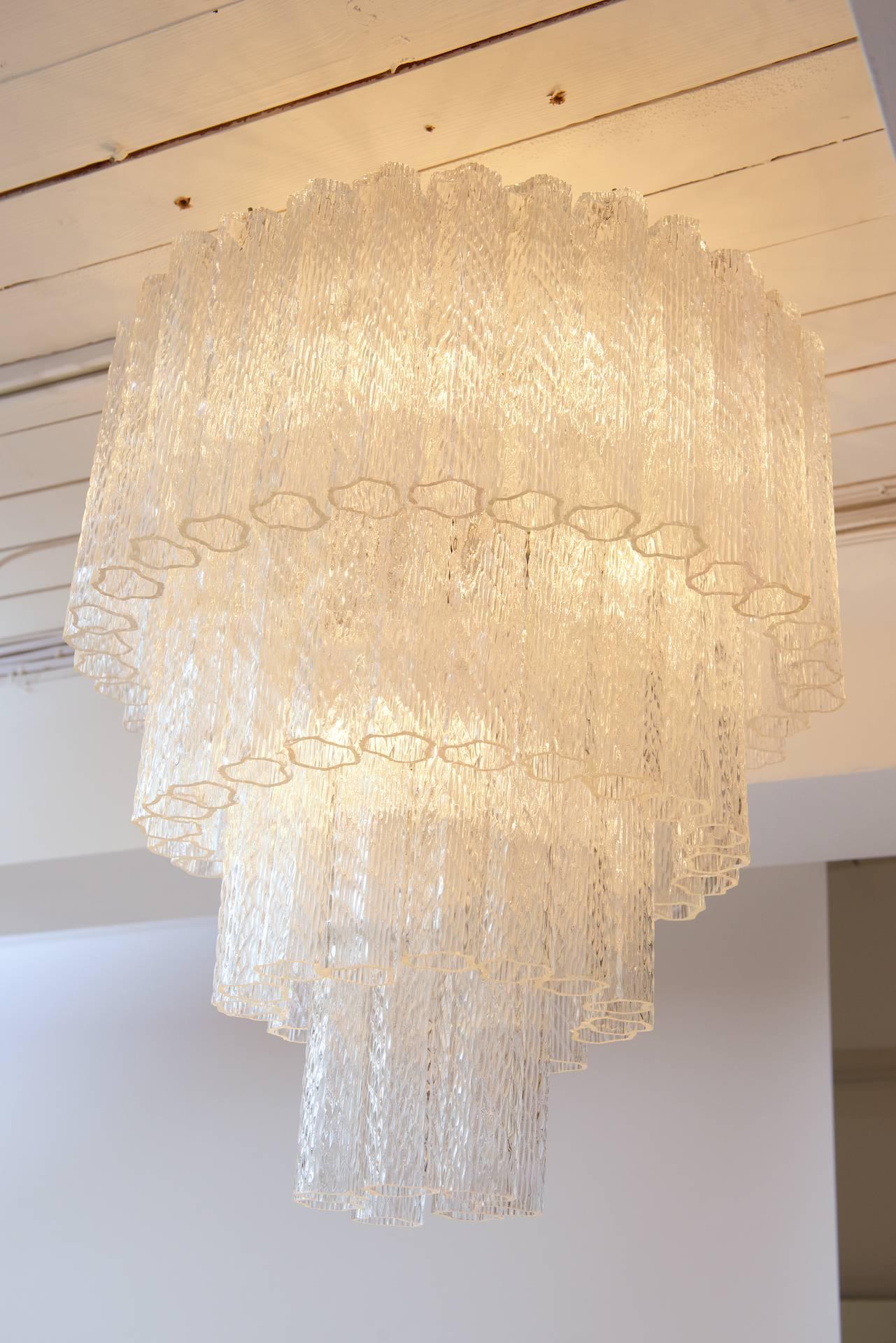 Italian four-tier chandelier

Can be adjusted from a flush mount to required drop.