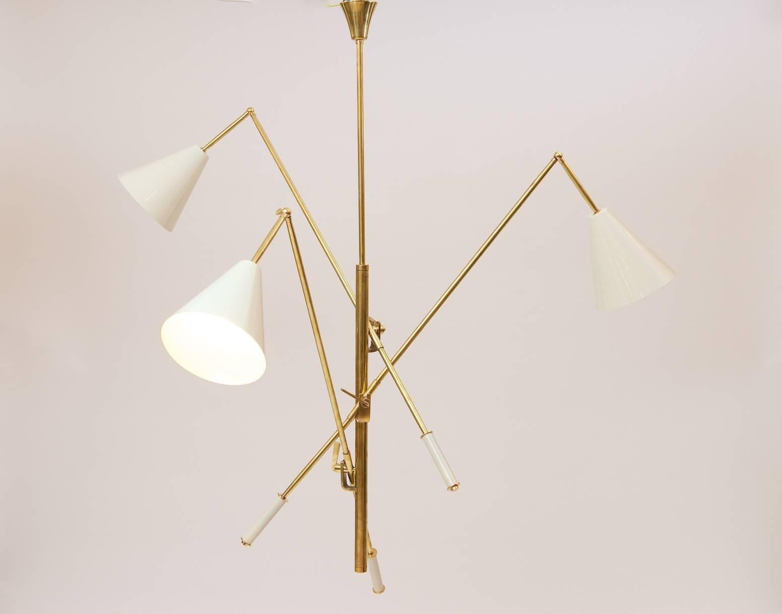 Painted metal and brass three shade ceiling light.
Based on the Triennale.
Excellent quality.

Central pole measures 120cm  (this can be shortened if required.)
Each arm measures 107cm to the ball joint of the shade
Shade measures 20.5cm(l) x