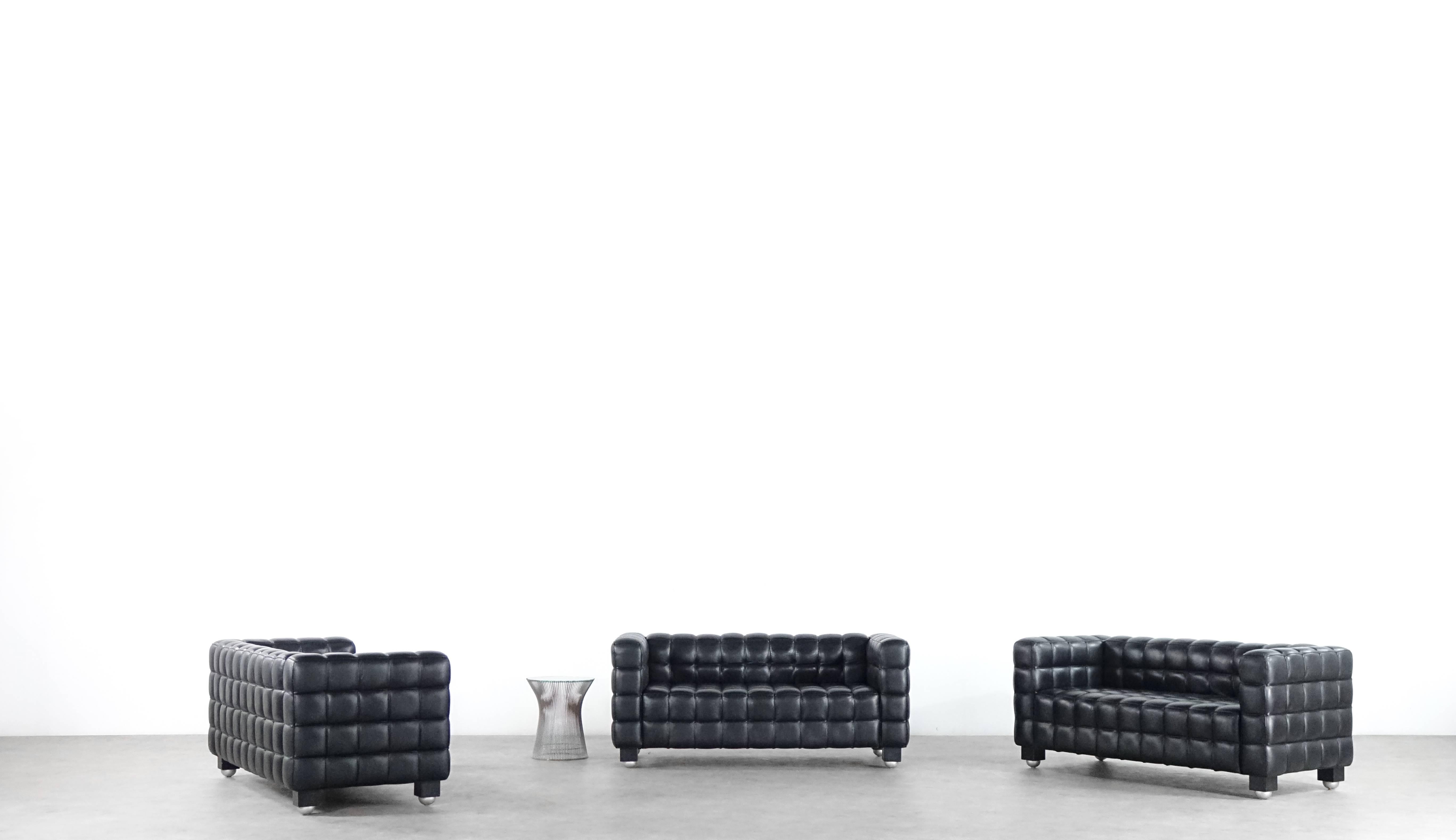 1x Kubus sofas, designed in 1910 by Josef Hoffmann. Edition by Wittmann/Austria. Excellent condition in black leather!

