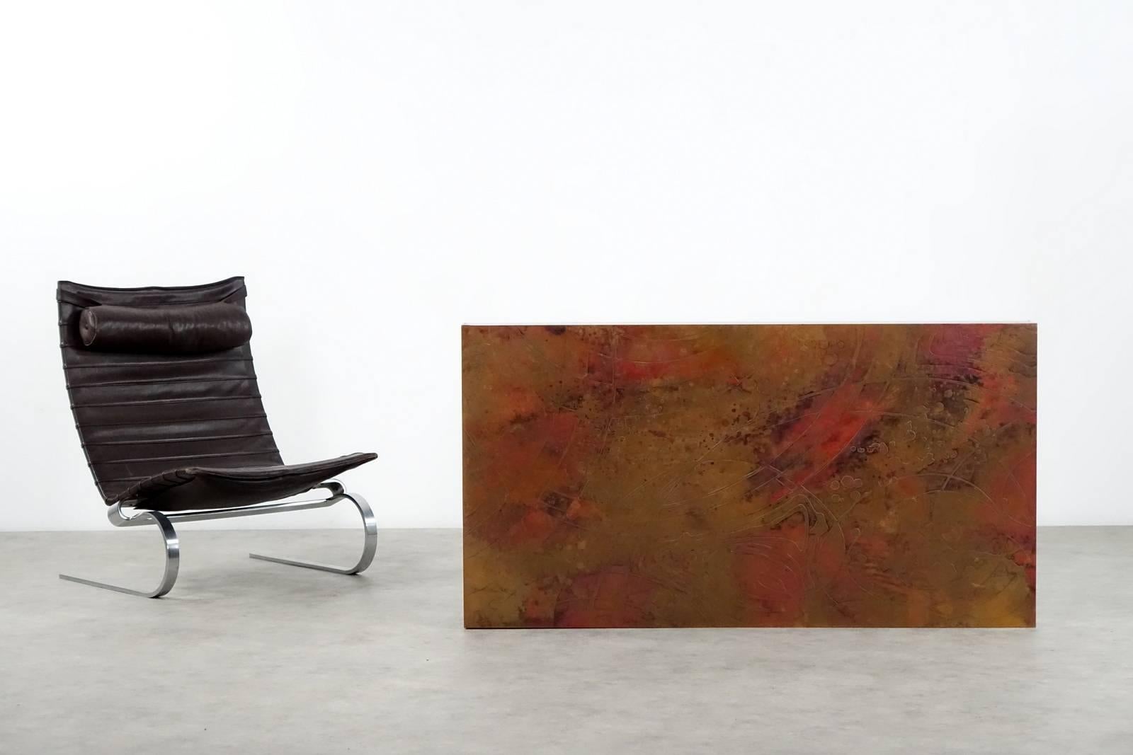 Good condition brutalist coffee table with black laquered wooden base and etched copper top. Made in Germany in the 1960s