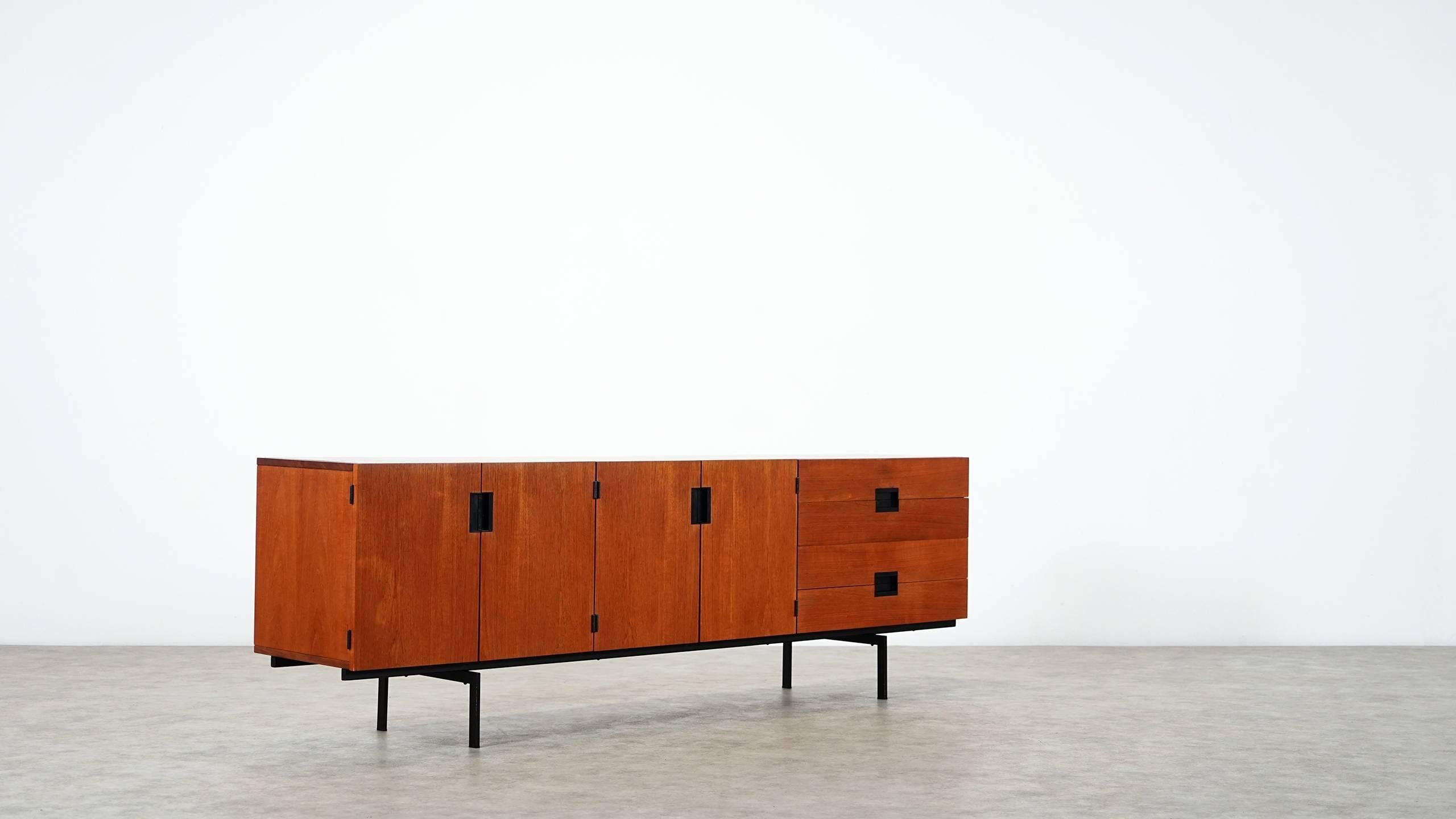 Minimalist sideboard designed by Cees Braakman for Pastoe, the Netherlands, 1958. 

This highly collectable DU-03 sideboard is regarded as a true icon of Dutch midcentury design. 
The sideboard has an outstanding clean geometrical design with a