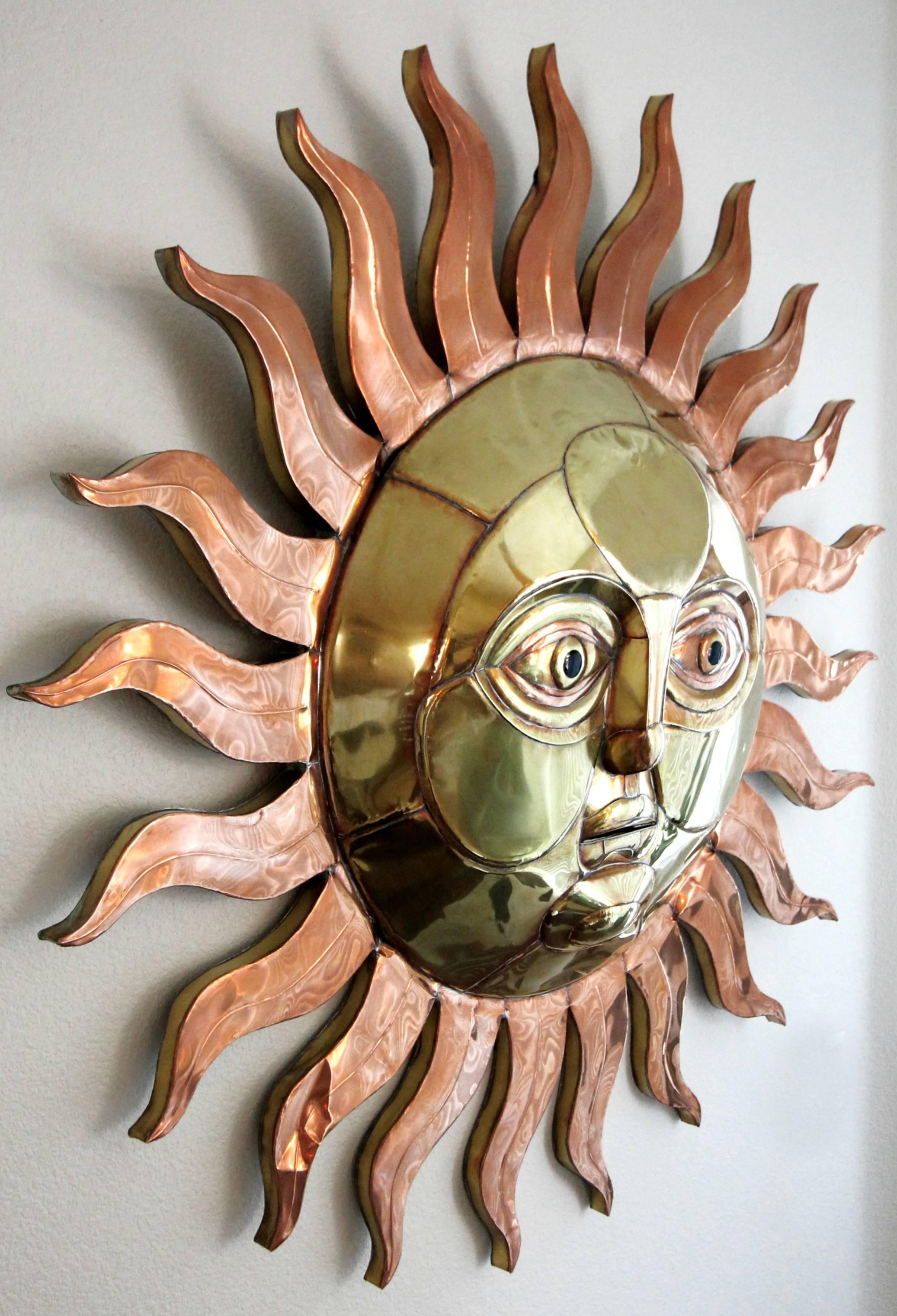 Gorgeous copper and brass Sun wall sculpture by Sergio Bustamante.
