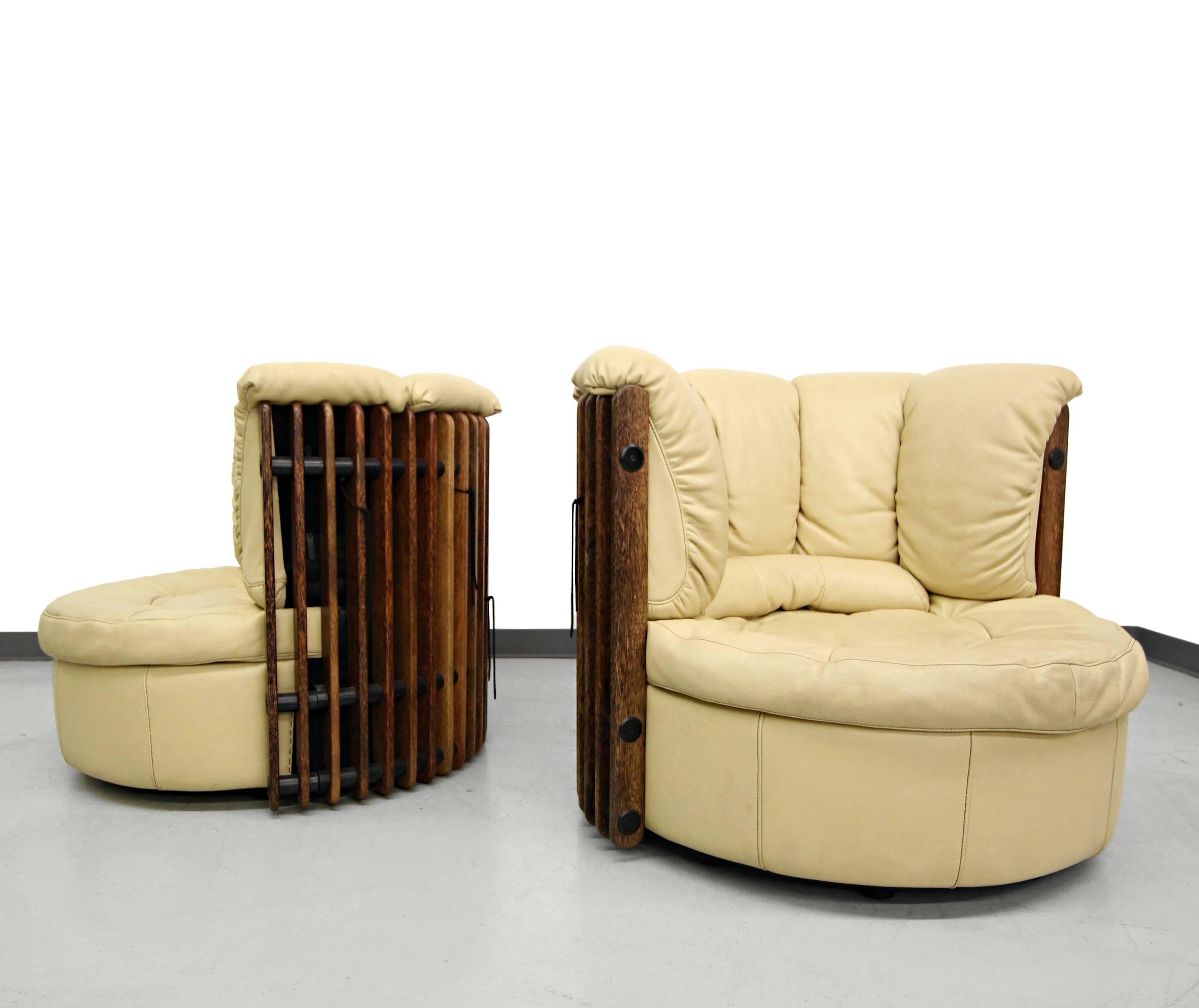 Pacific Green's Isle D'Palm palm wood and leather swivel chairs. Constructed out of shell of Palmwood® slats and leather. Chairs swivel a full 360 degrees.

Pacific Green is a sustainable furniture company based in Australia that was started in