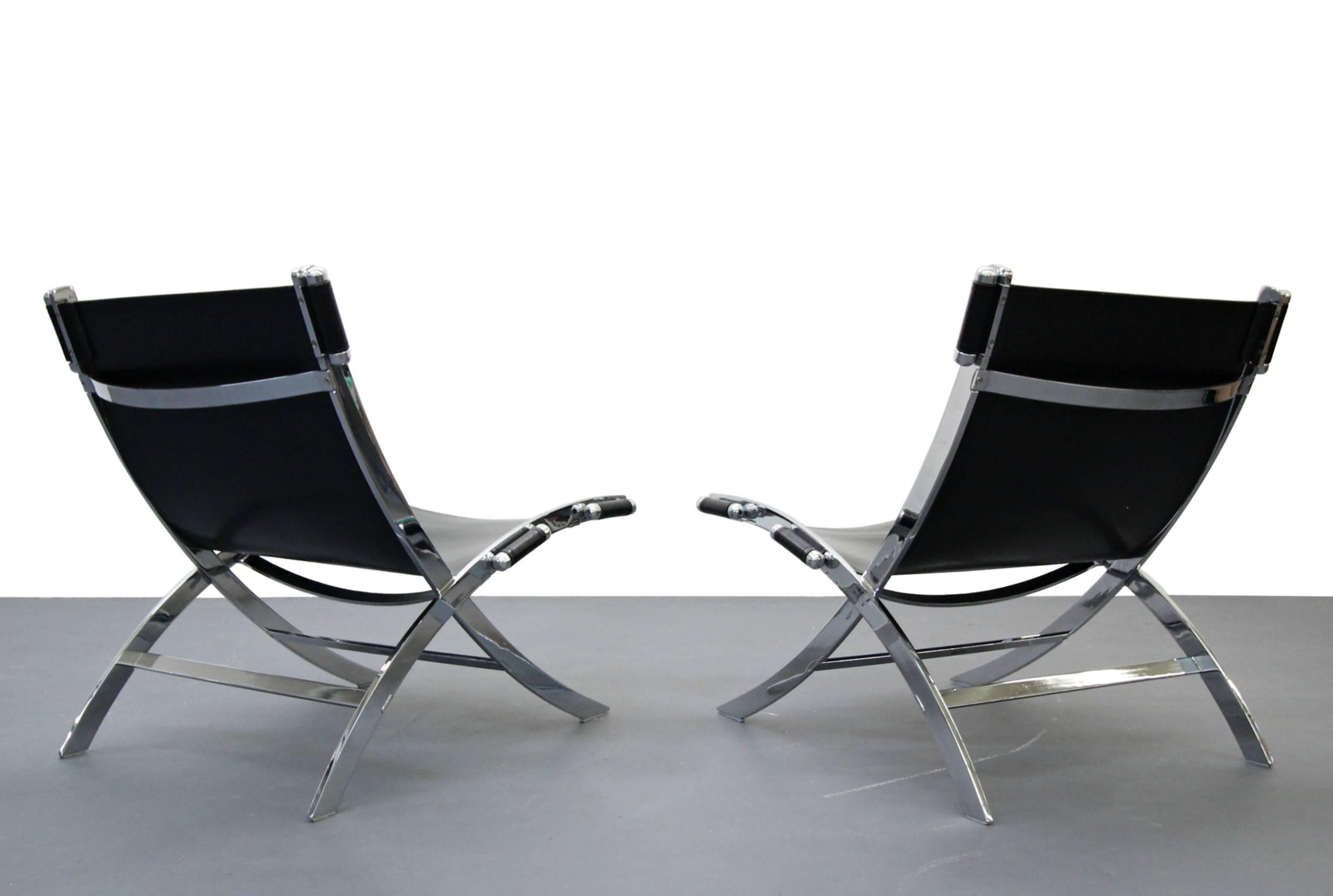 This pair of Mid-Century Italian chrome and leather sling scissor chairs. This gorgeous pair of chairs is heavy duty, weighing close to 75lbs a piece. They are constructed out of solid steel and thick genuine leather. These chairs are very modern in