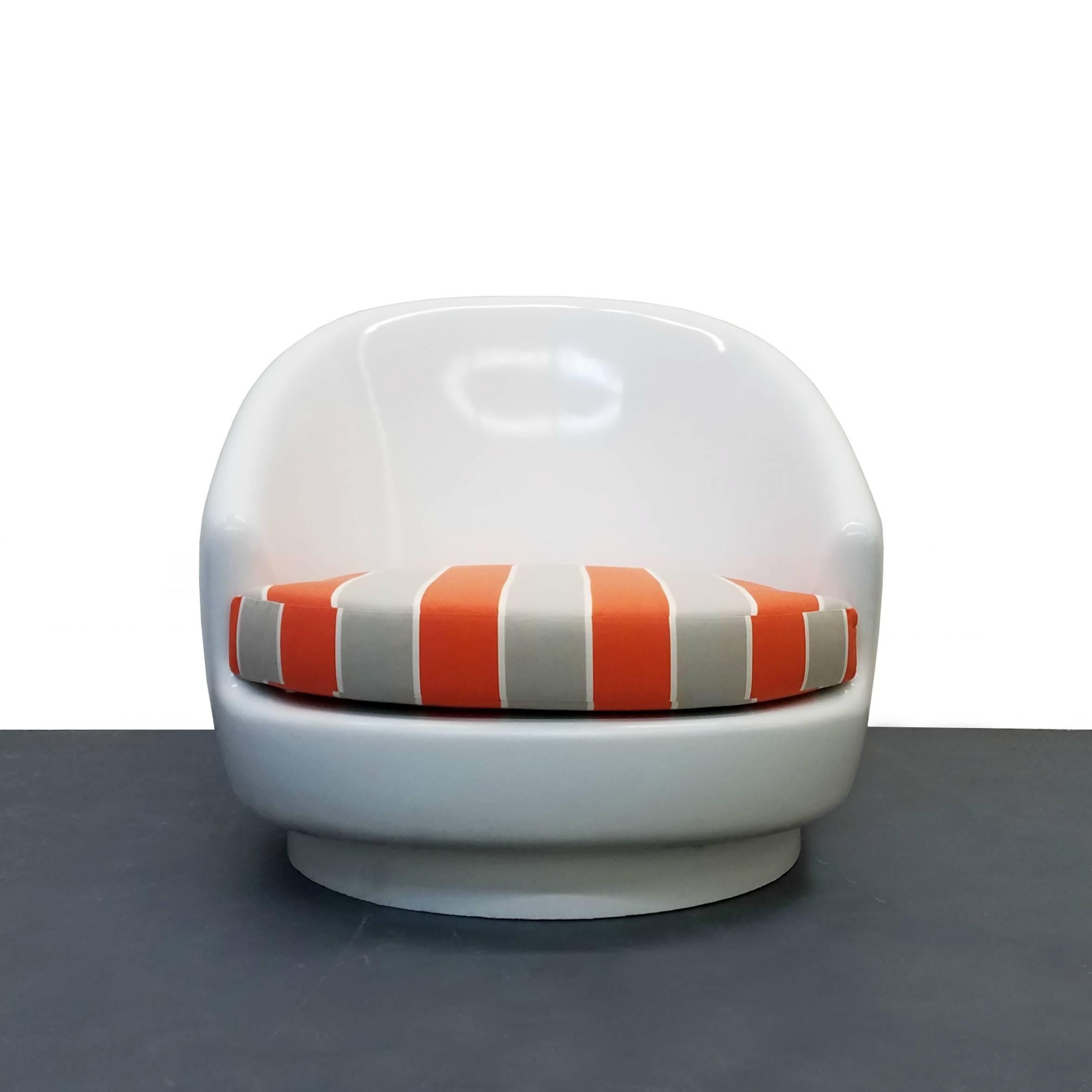 Oversized and by oversized I mean Huge, fiberglass egg shape indoor outdoor chair. Cushion is all new with fade resistant outdoor fabric in a fun orange and gray stripe. Can be used indoor as a fun conversation piece or outdoor on a patio or pool