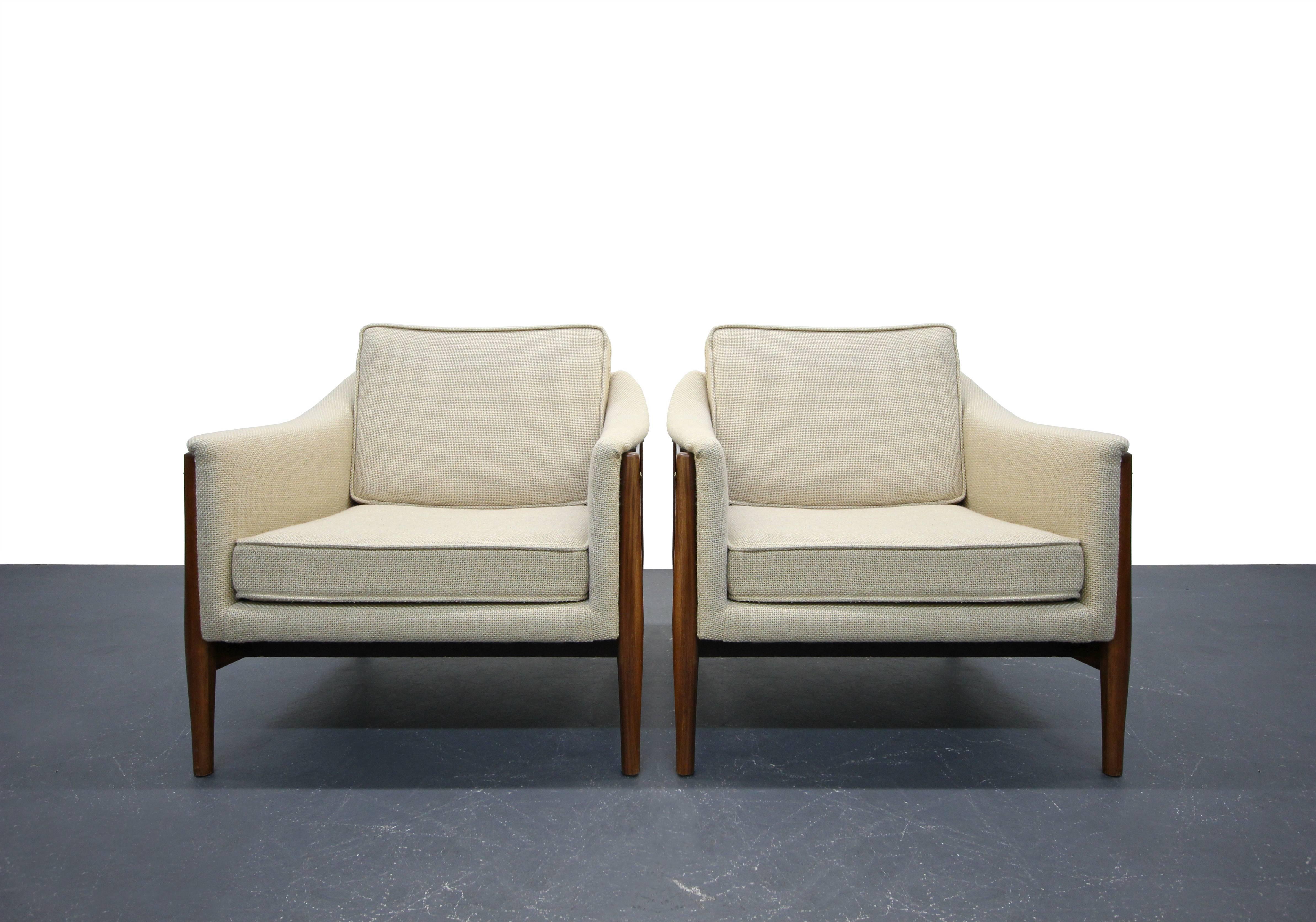 All original pair of Danish Mid-Century Modern lounge chairs in near perfect original condition. They are the epitome of Classic Mid-Century Modern chairs. These chairs are heavy duty, solid pieces in excellent condition.

For those not keen to