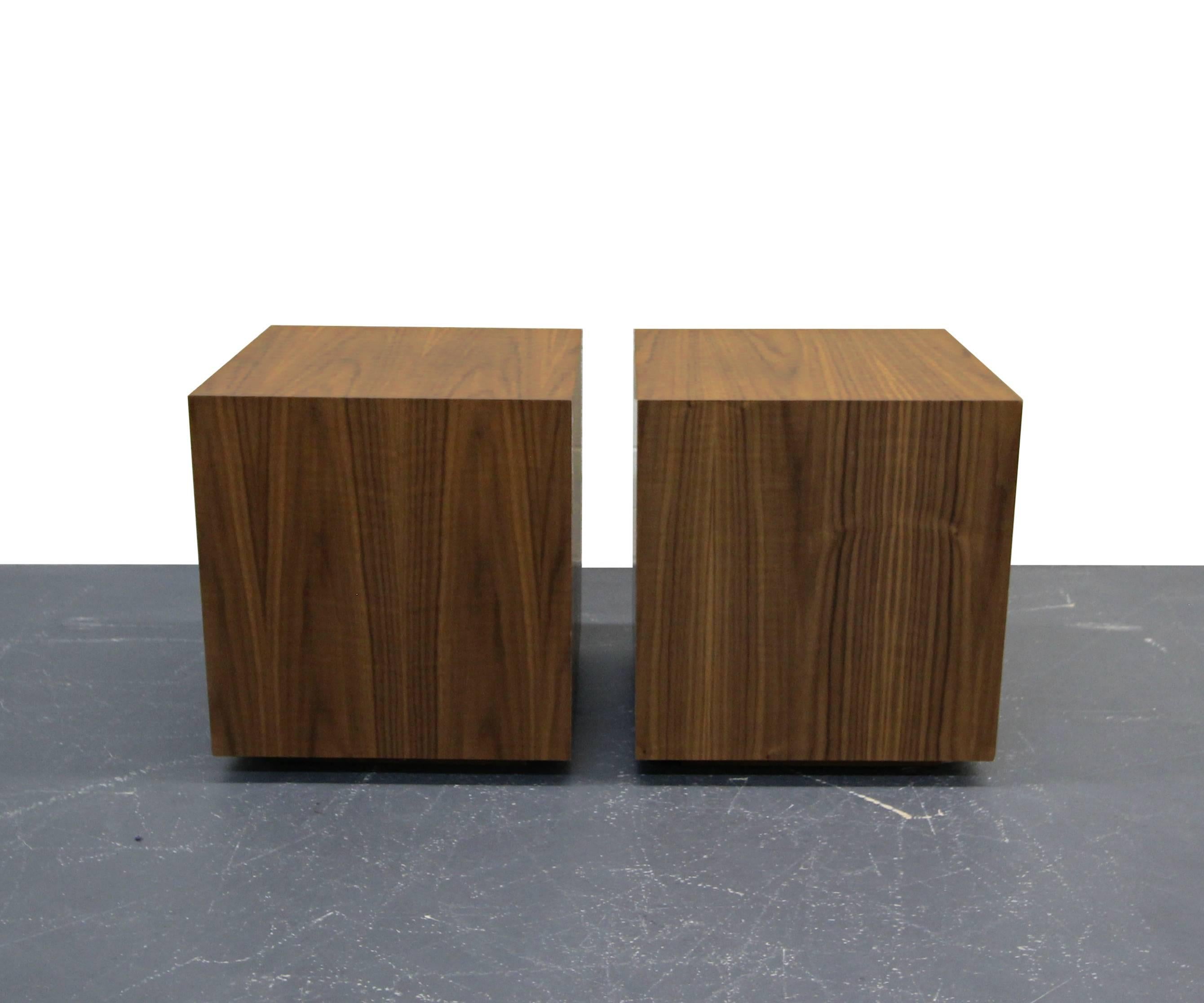 Perfect pair of walnut cubes with plinth bases. They would make perfect tables or stools.

       