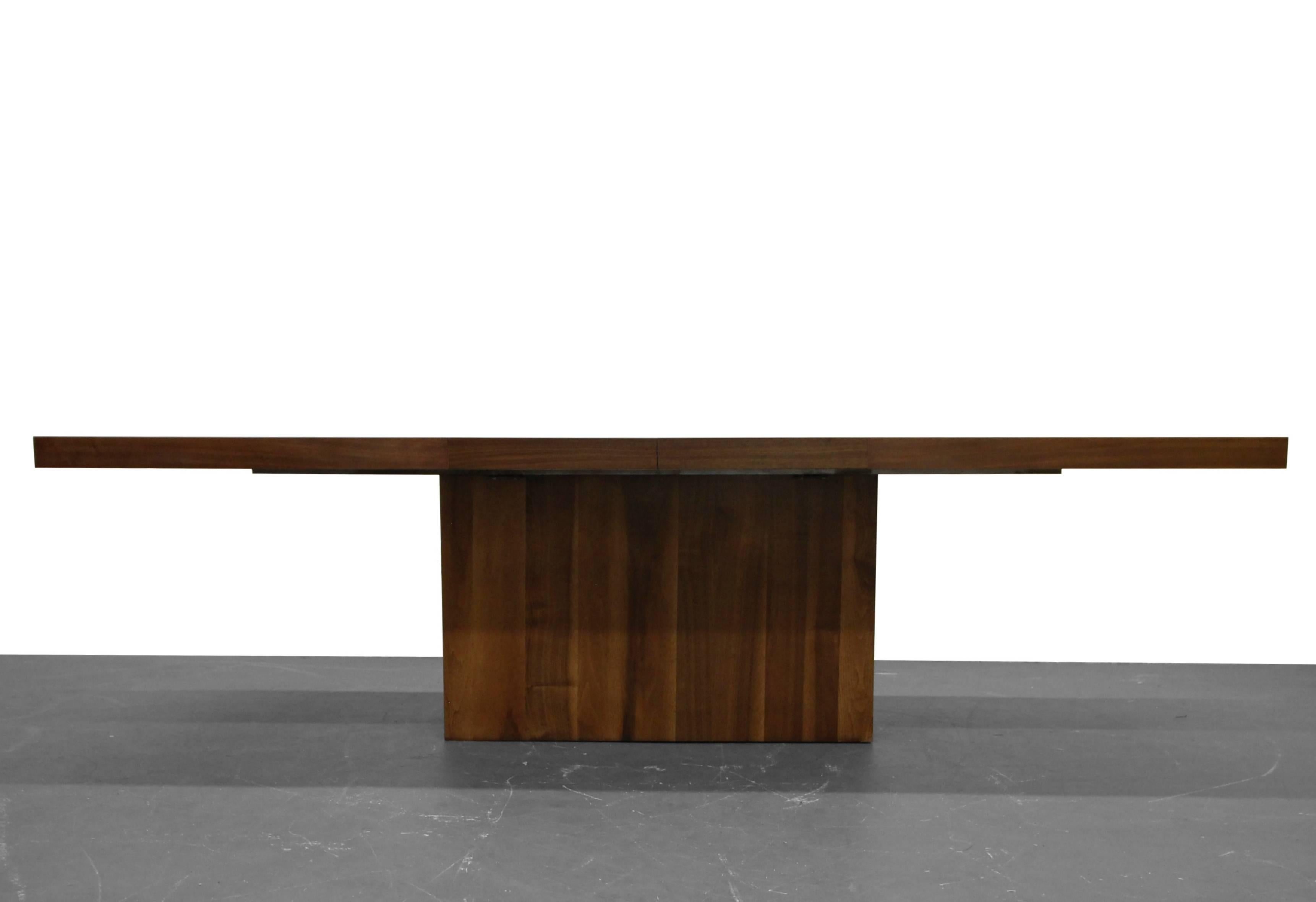 Stunning table. Walnut pedestal dining table by Milo Baughman for Thayer Coggin. Beautiful walnut top and matching walnut base. The perfect minimalist dining table. Lines don't get much cleaner.

Table measures 6ft closed, but extends to a massive