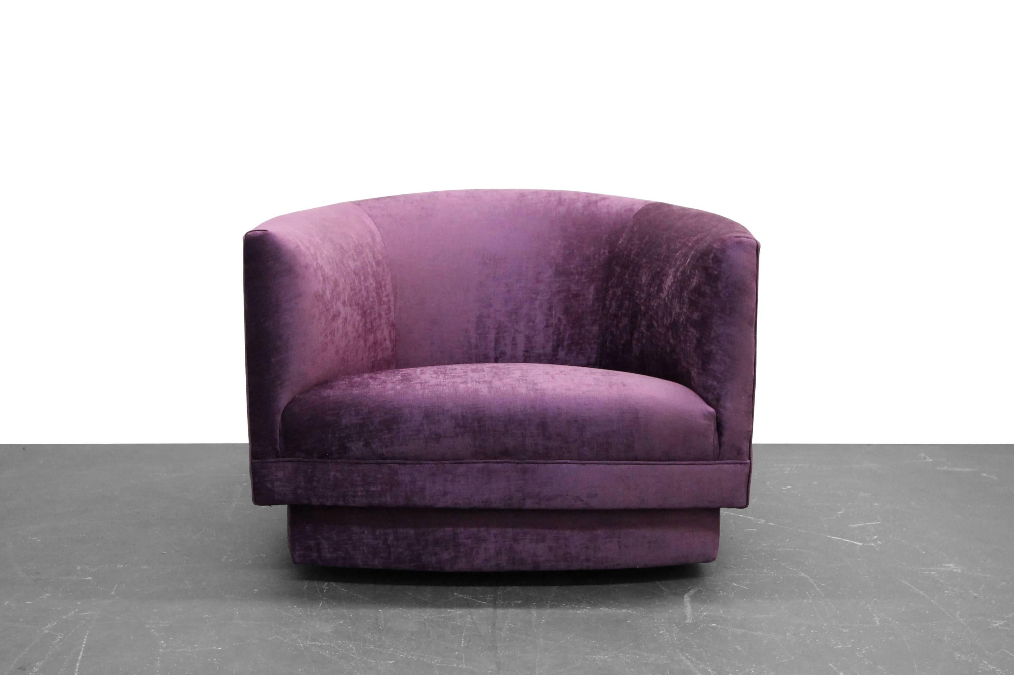 Great one off midcentury swivel chair by Milo Baughman. Great size chair in the perfect shade of purple. Love how the base is shaped to the chair.

Completely restored with all new foam and dark purple fuscia velvet.