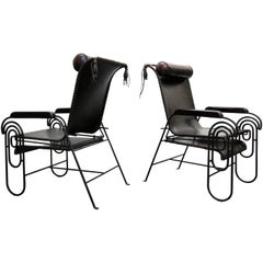 Pair of Art Deco Iron and Leather Rocking Lounge Chairs