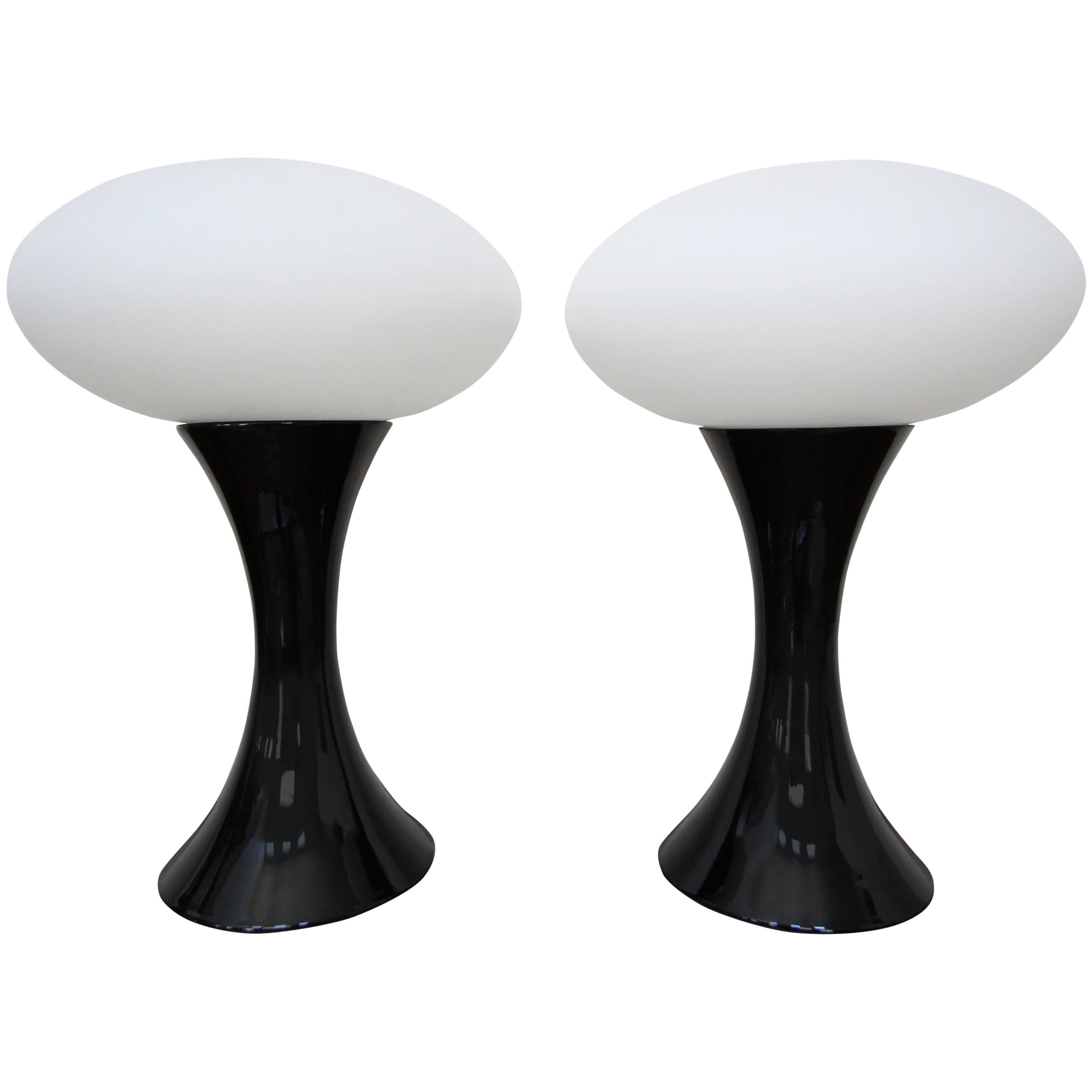 This is a perfect pair of Italian ceramic and porcelain table lamps. Finished in a high gloss and topped with a classic Laurel Lamp Company style shade, these beauties are real show stoppers.

Dimensions:
Overall: 20.25