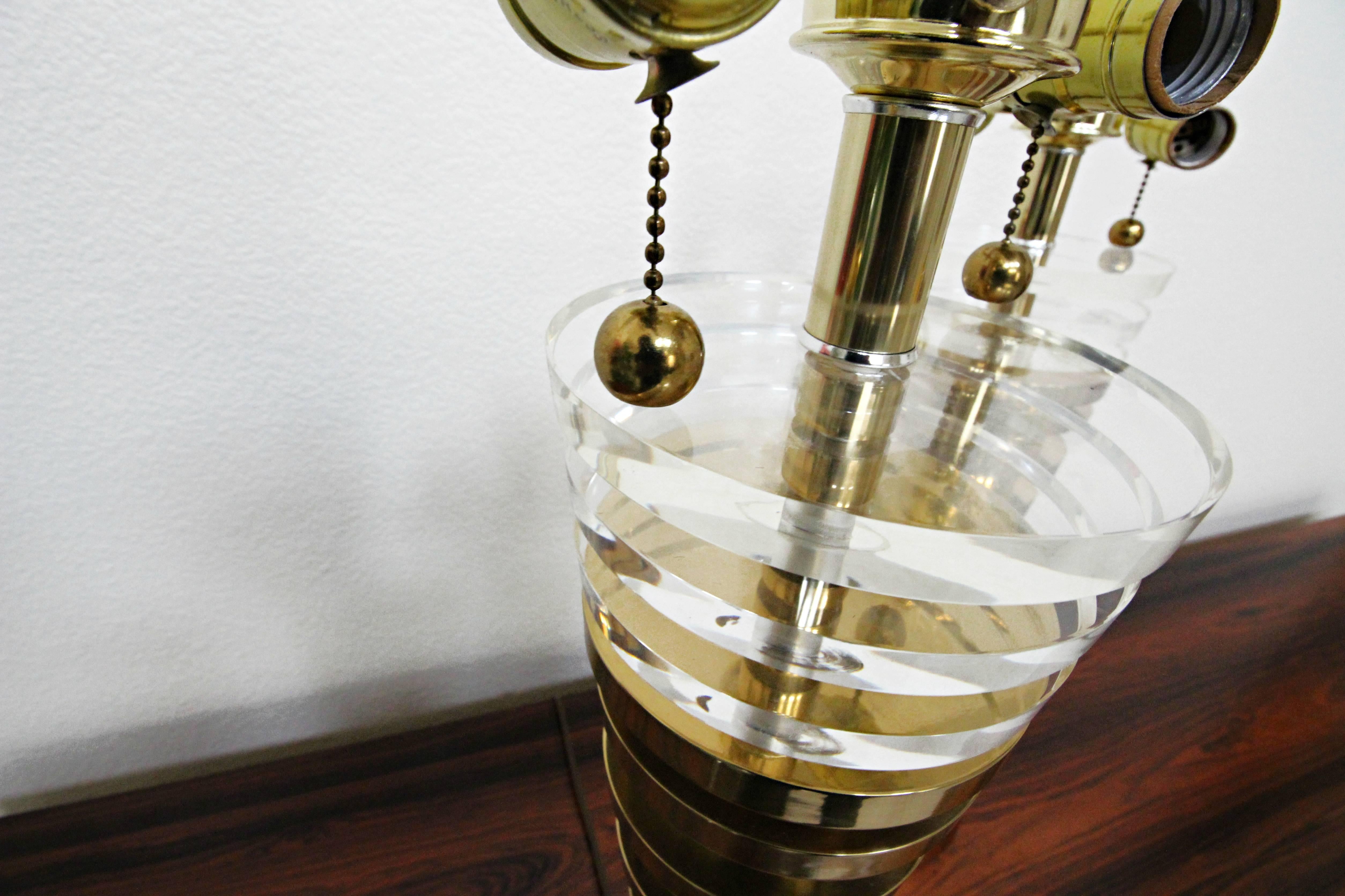 Substantial Pair of Conical Stacked Brass and Lucite Table Lamps In Excellent Condition In Las Vegas, NV