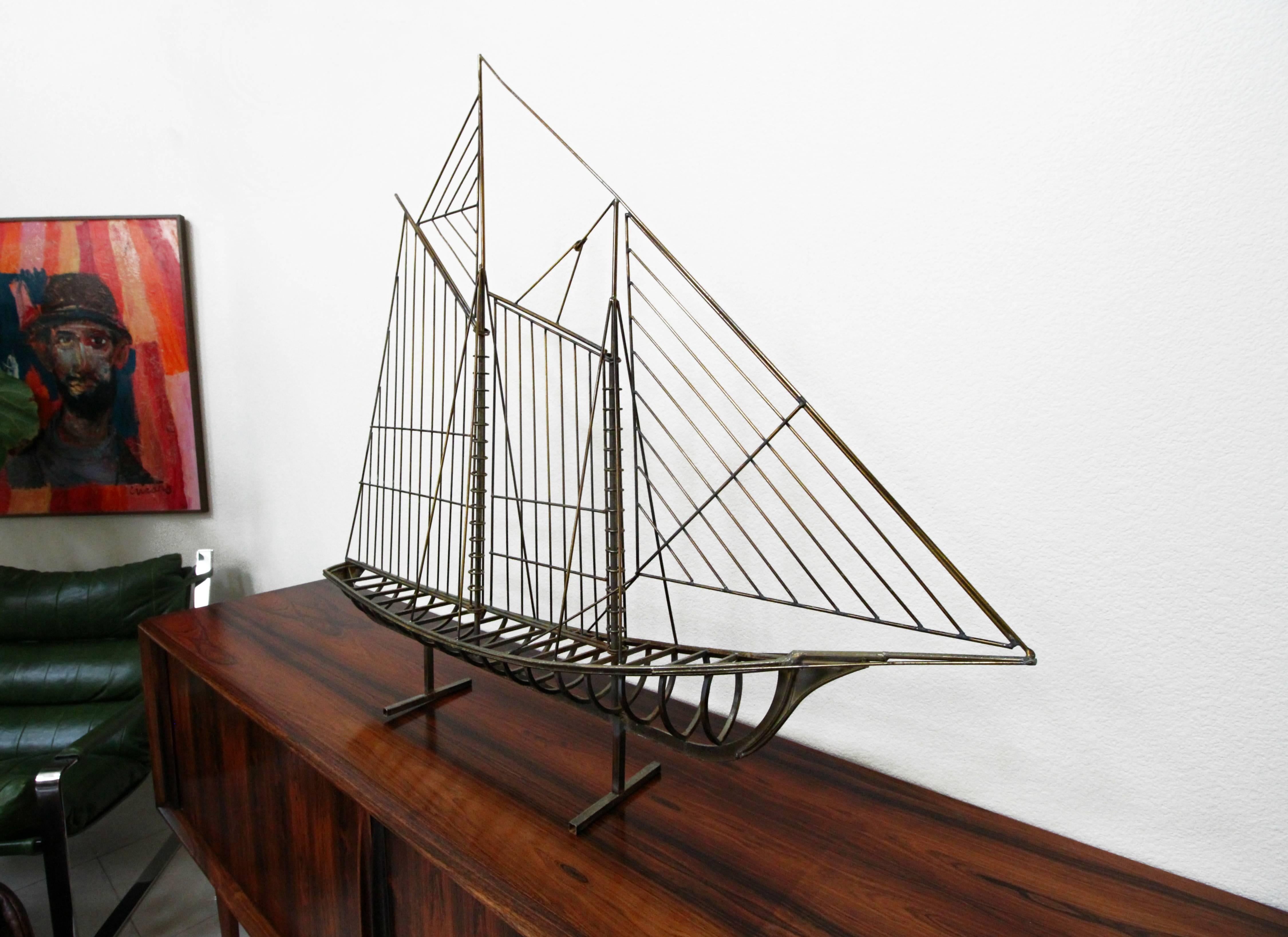 Curtis Jere Classic. This large ship sculpture can stand freely on a surface or be wall-mounted using the original, attached wall mount. Signed.
