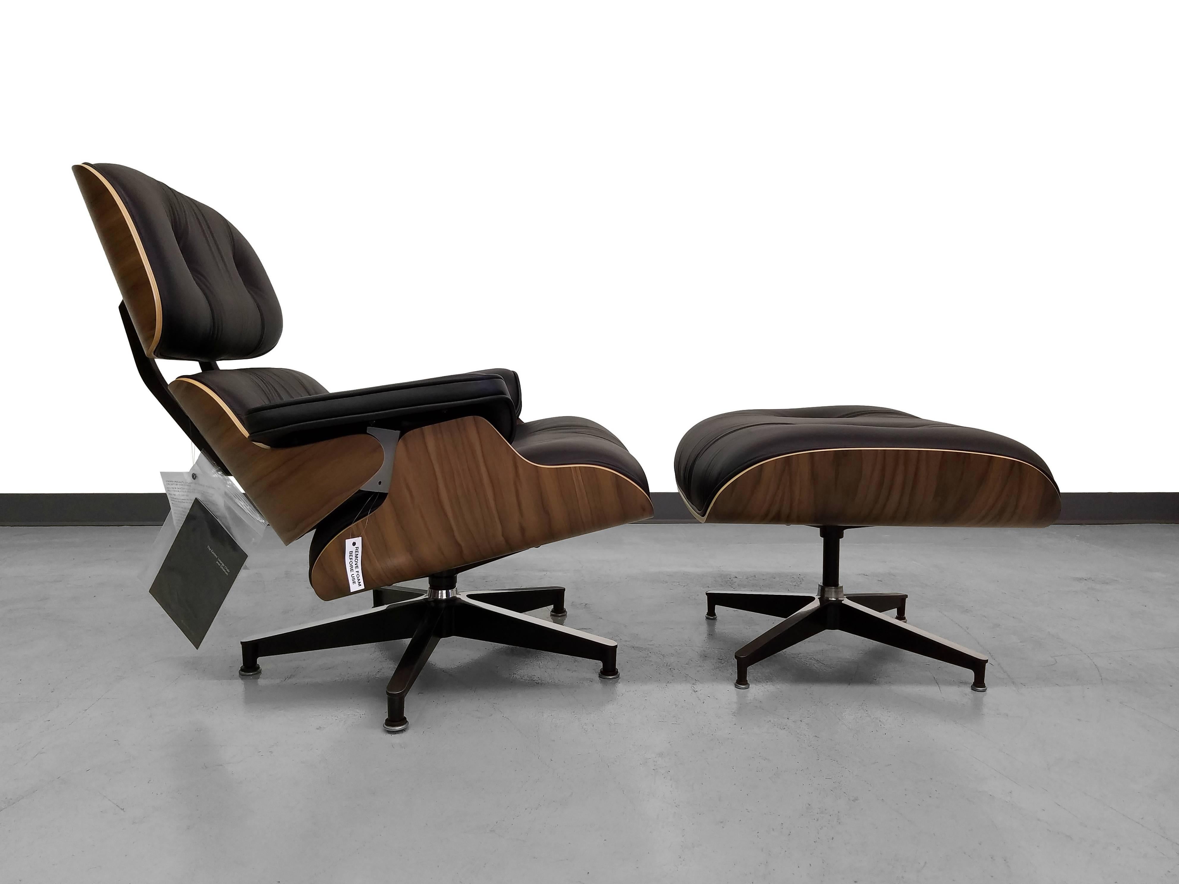 Brand new with tags, authentic Herman Miller Eames lounge chair. Walnut finish. Mint condition. Dated July 2015.