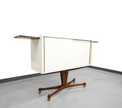 Super Rare Vladimir Kagan Rolling Pedestal Bar with Sculpted Walnut Base